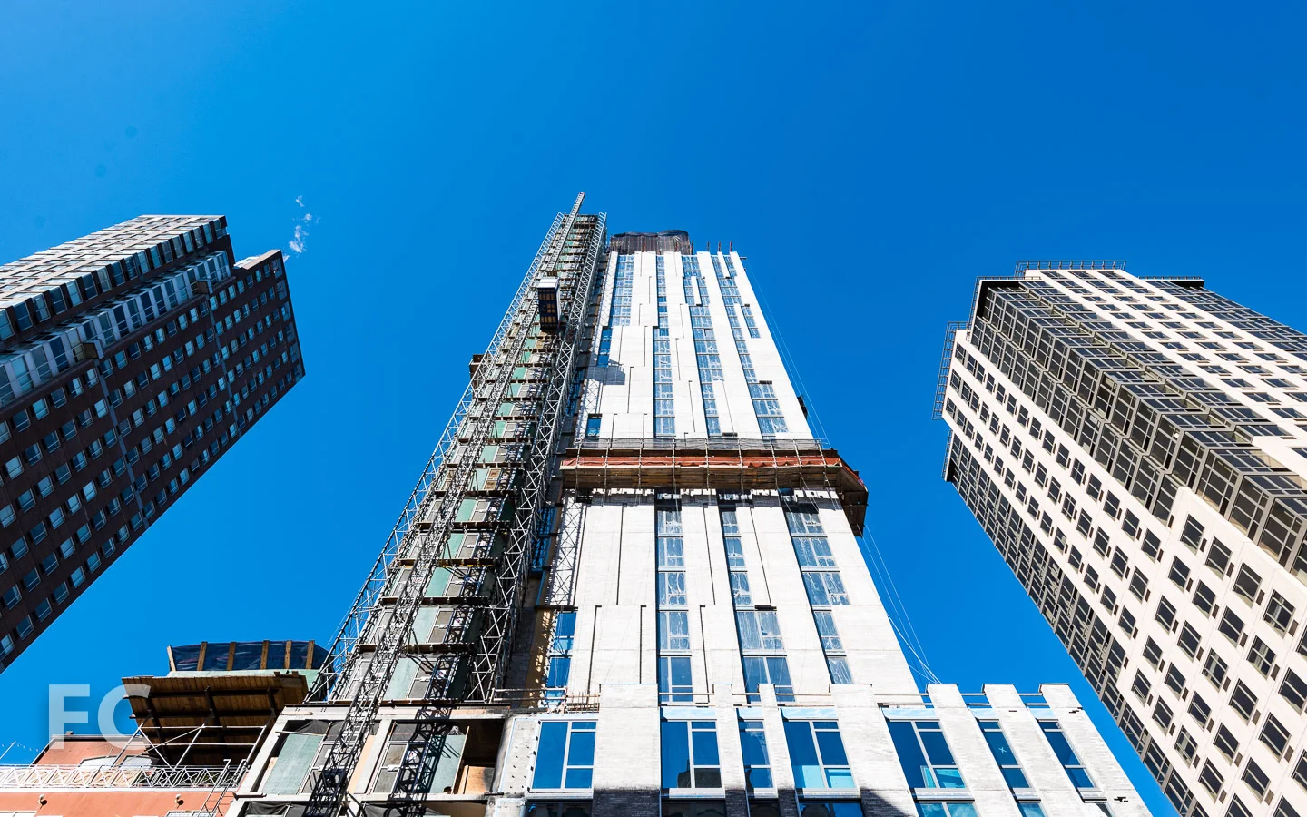 Looking up at the east facade from First Avenue.