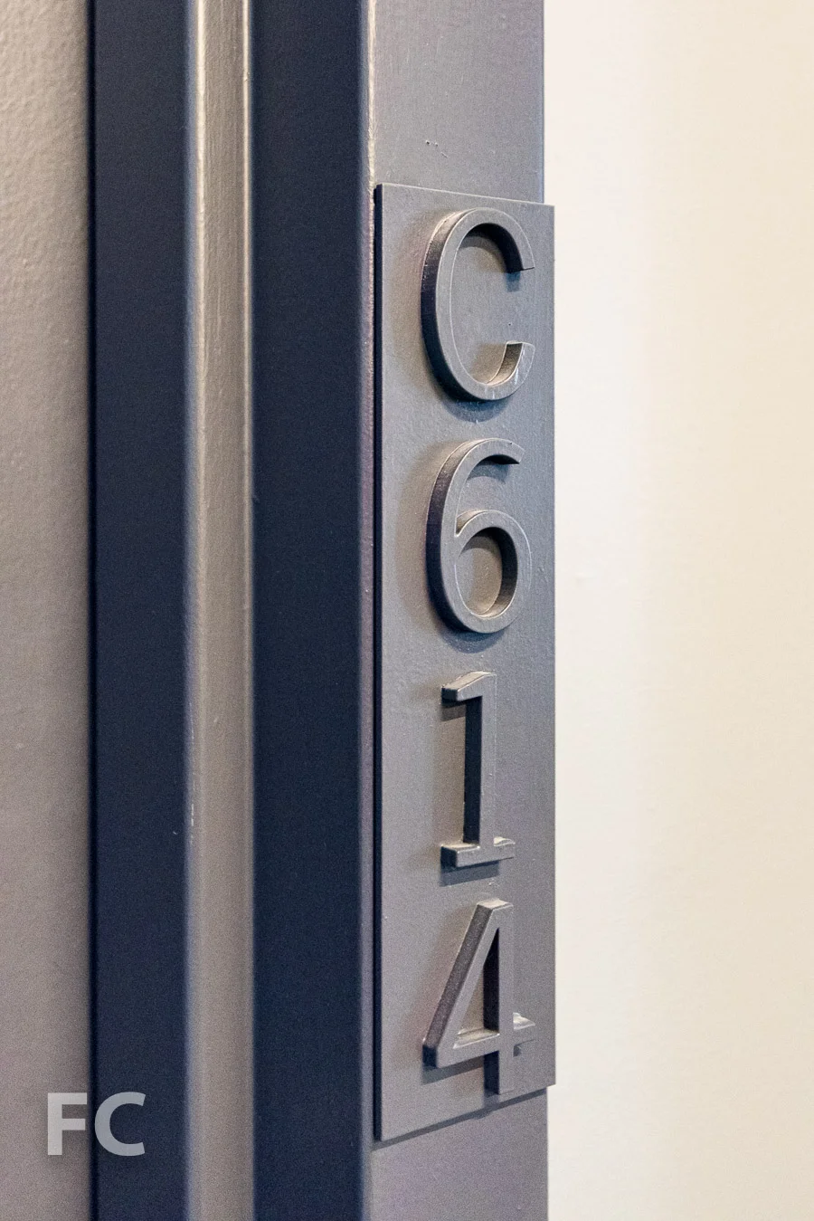 Unit number entry signage.