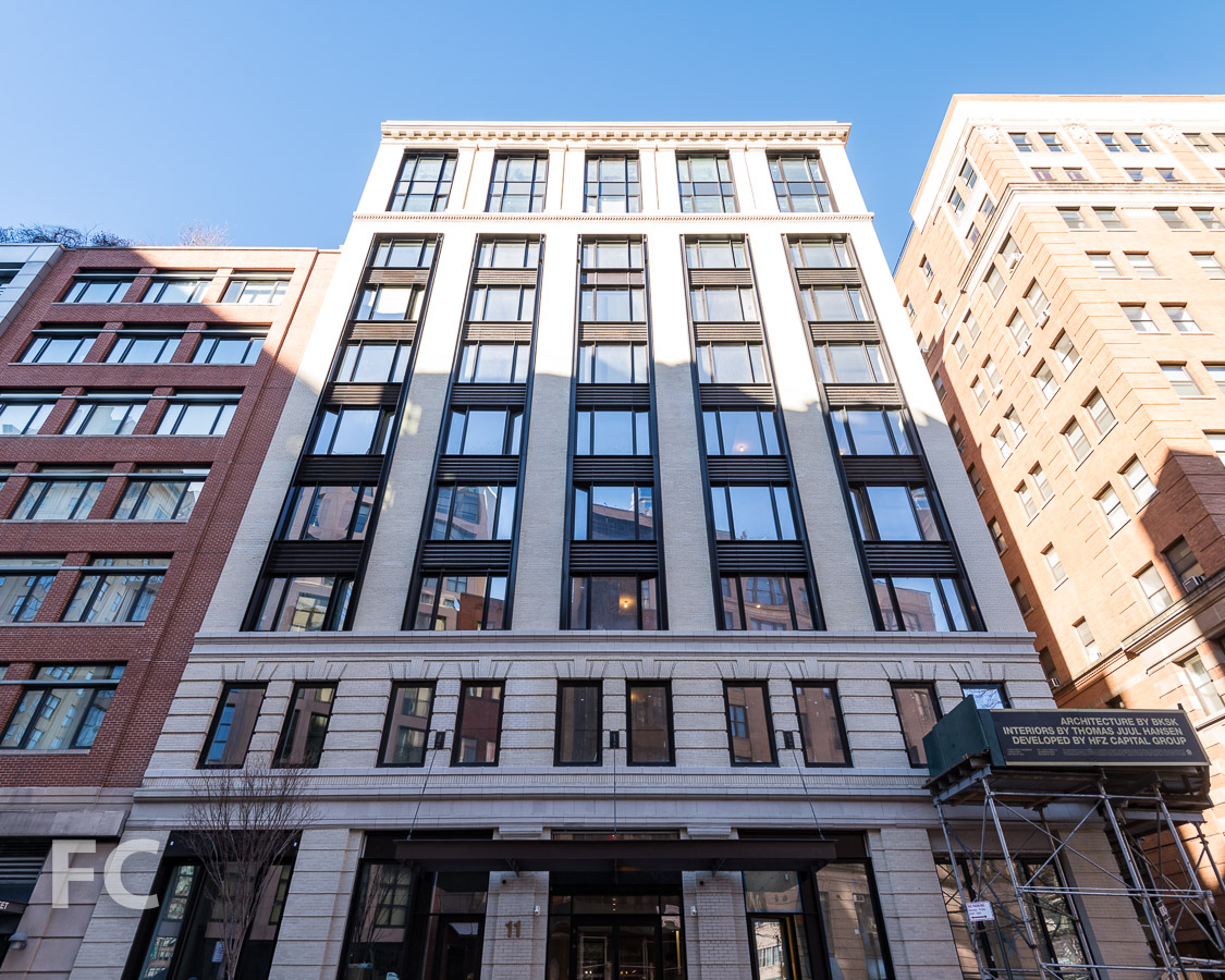 Looking up at the south facade from Beach Street.