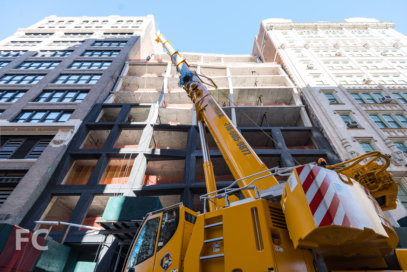 Looking up at the south facade from East 22nd Street.