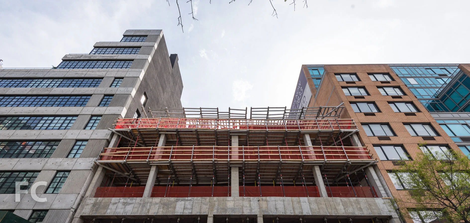 Looking up at the north façade from West 24th Street.