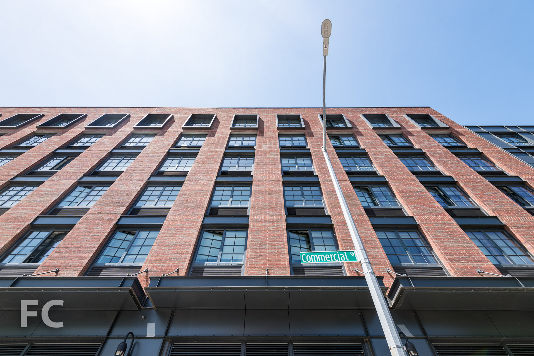 Looking up at the south façade from Commercial Street.