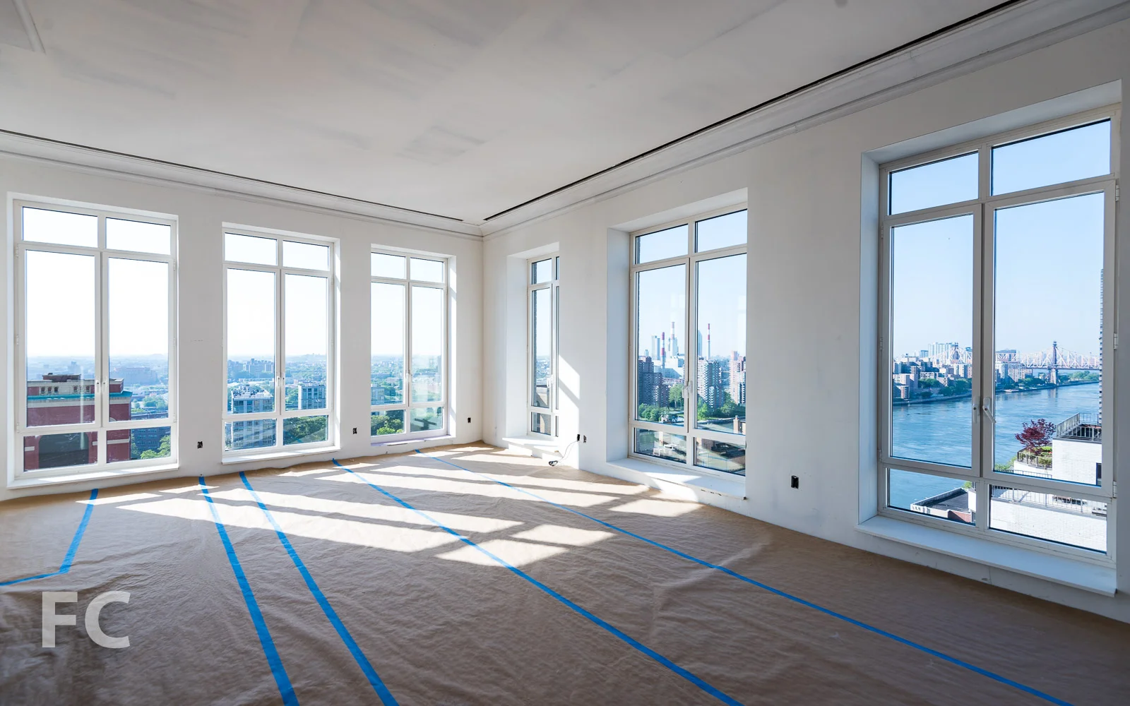 Penthouse living space with southeast corner view..