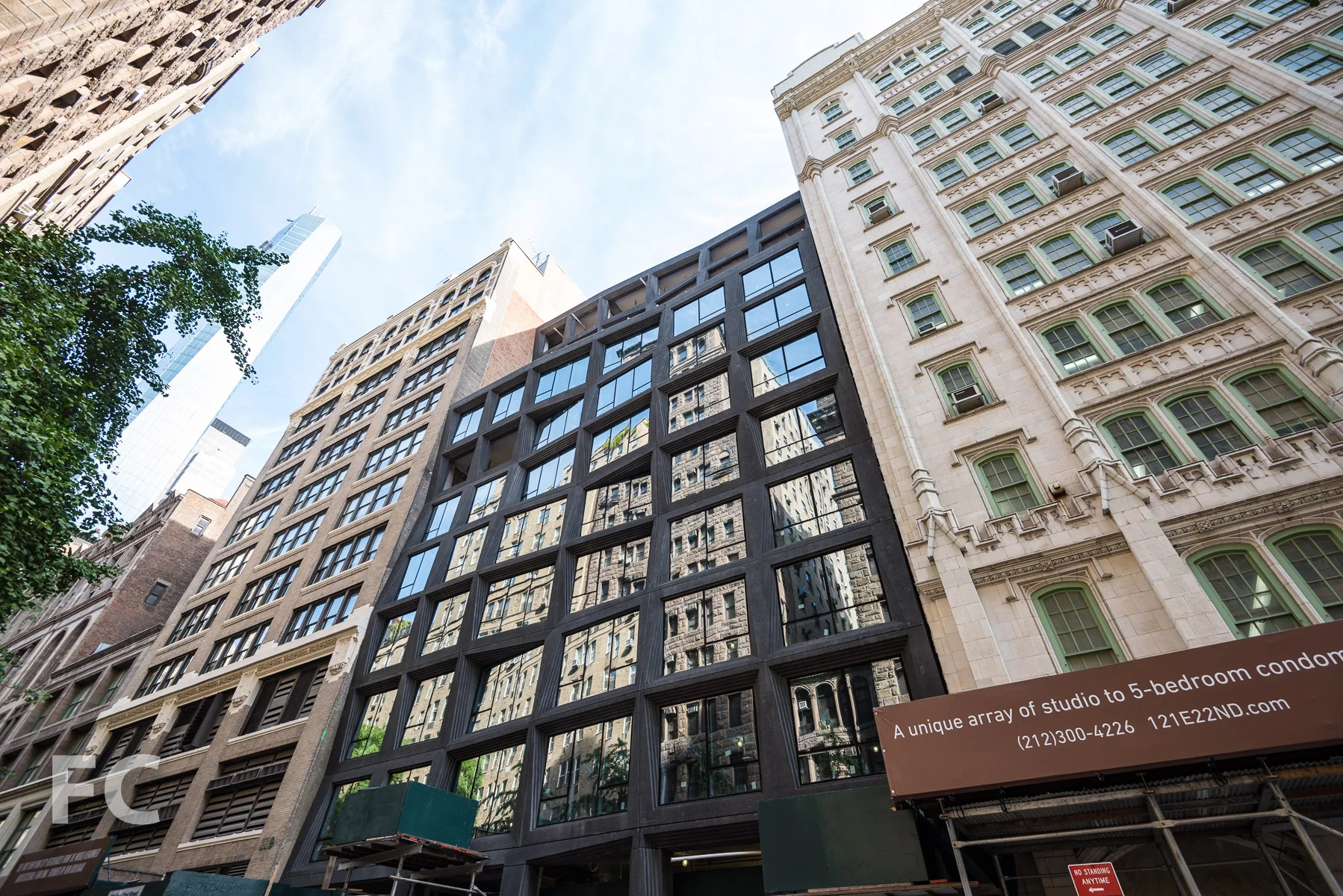Looking up at the south façade of the south tower from East 22nd Street.