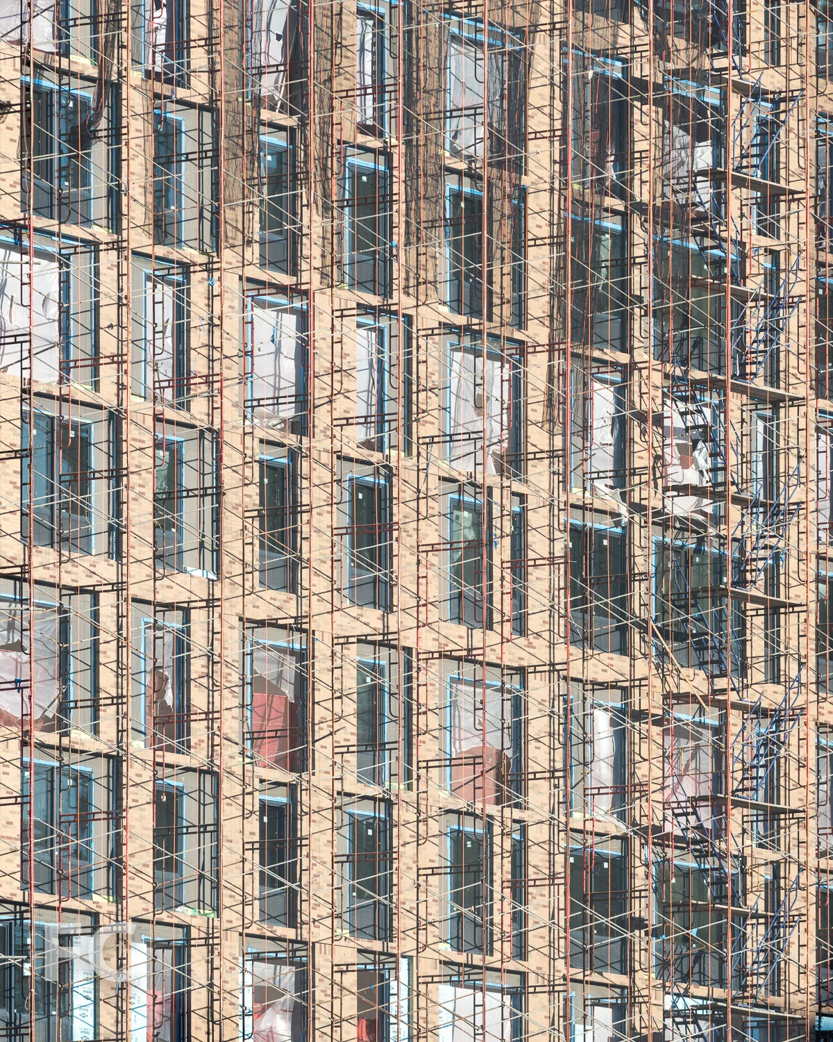 Close-up of the west façade, with construction scaffolding.