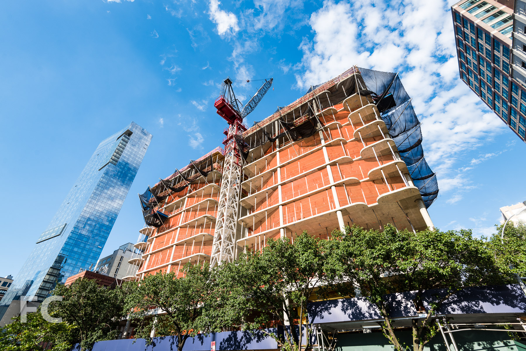Looking up at the west façade from Varick Street.