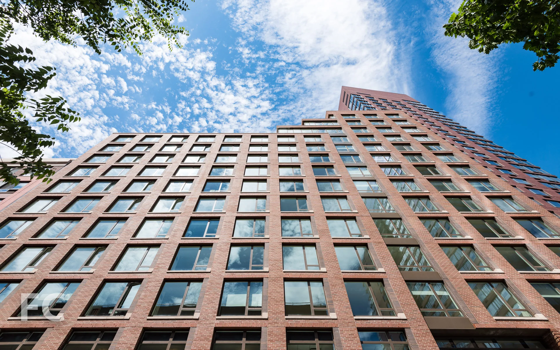 Looking up at the south tower from West 52nd Street.