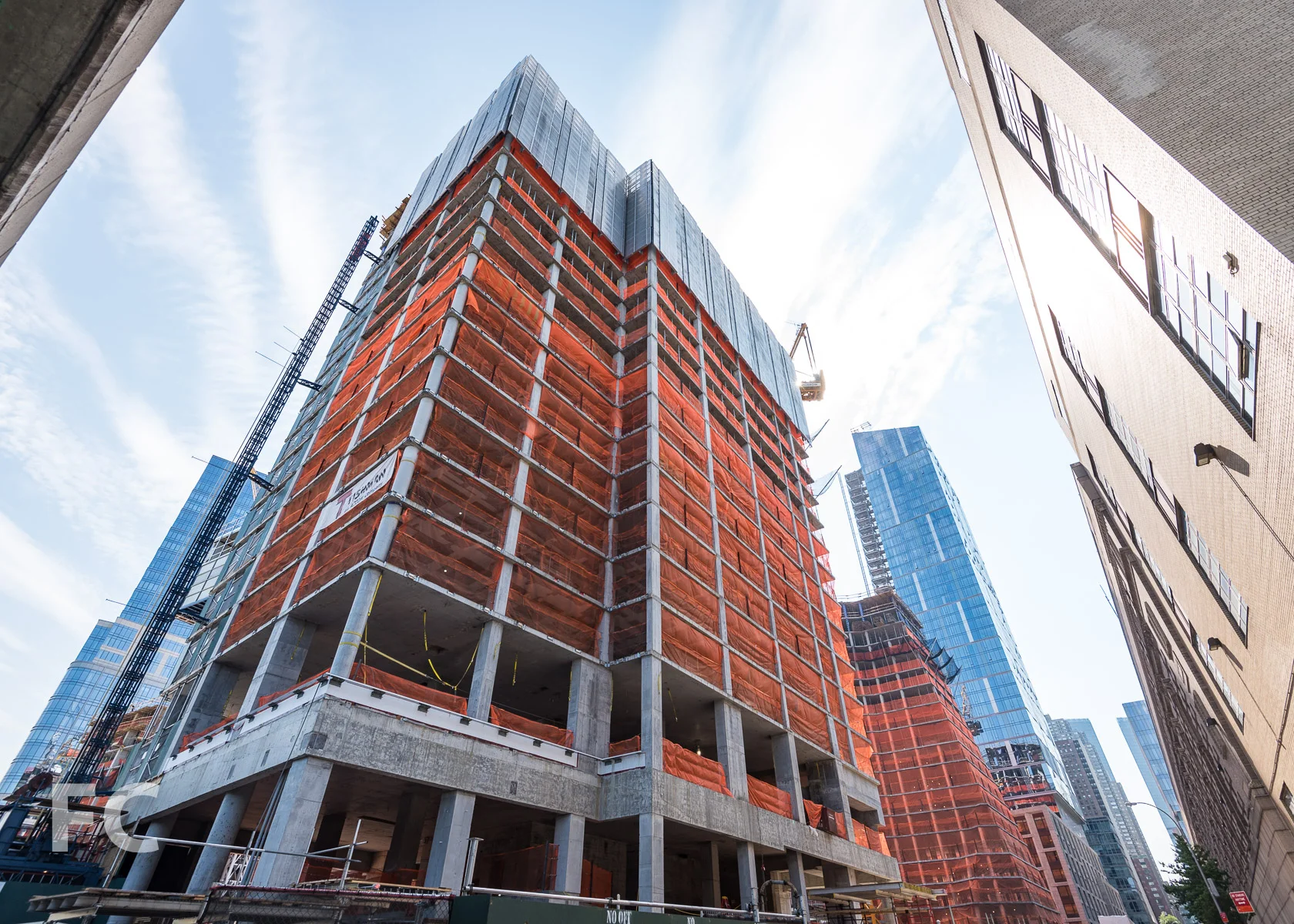 Looking up at the southwest corner of One Waterline Square from 12th Avenue.