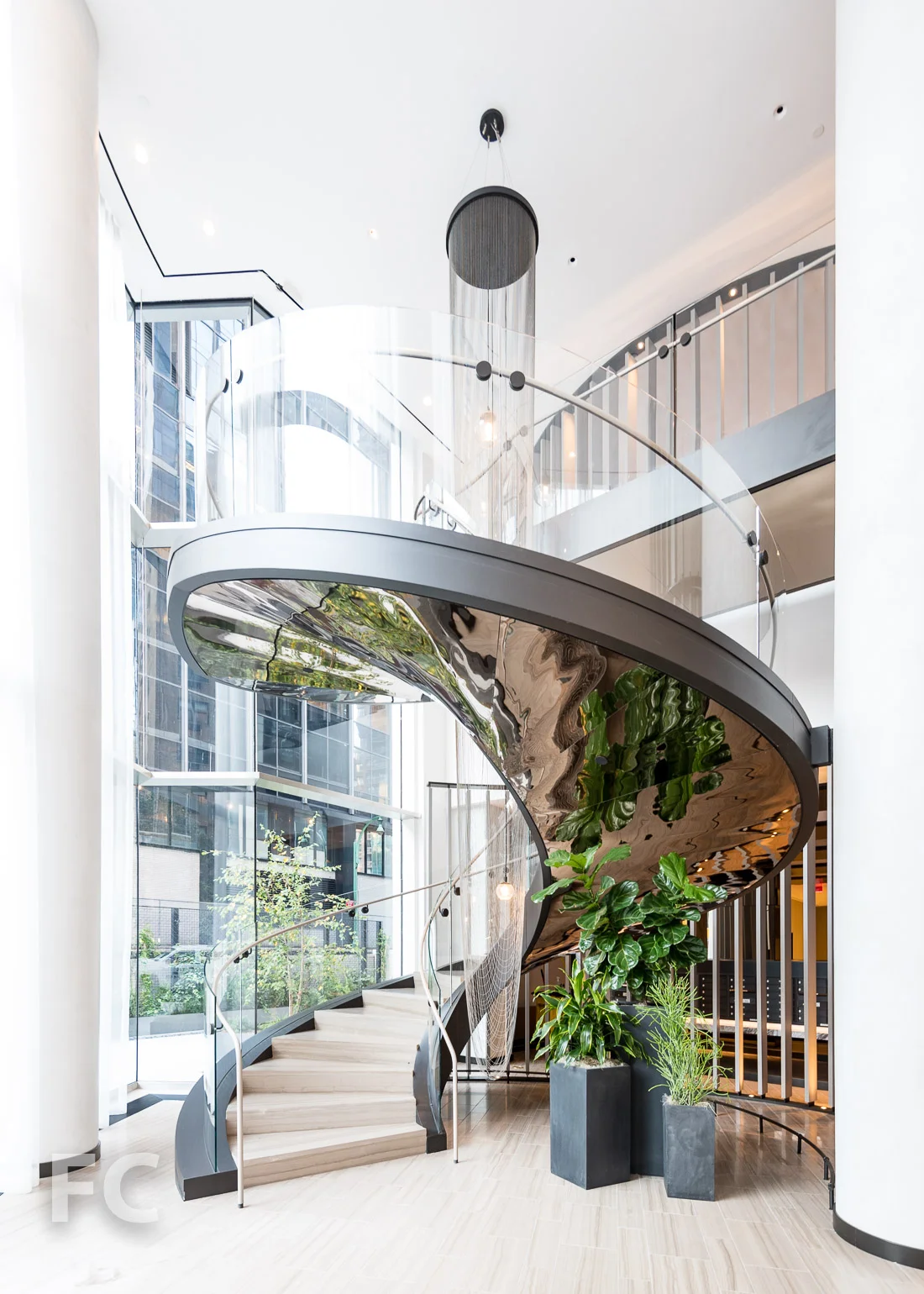 Double helix stair to the residential amenities.