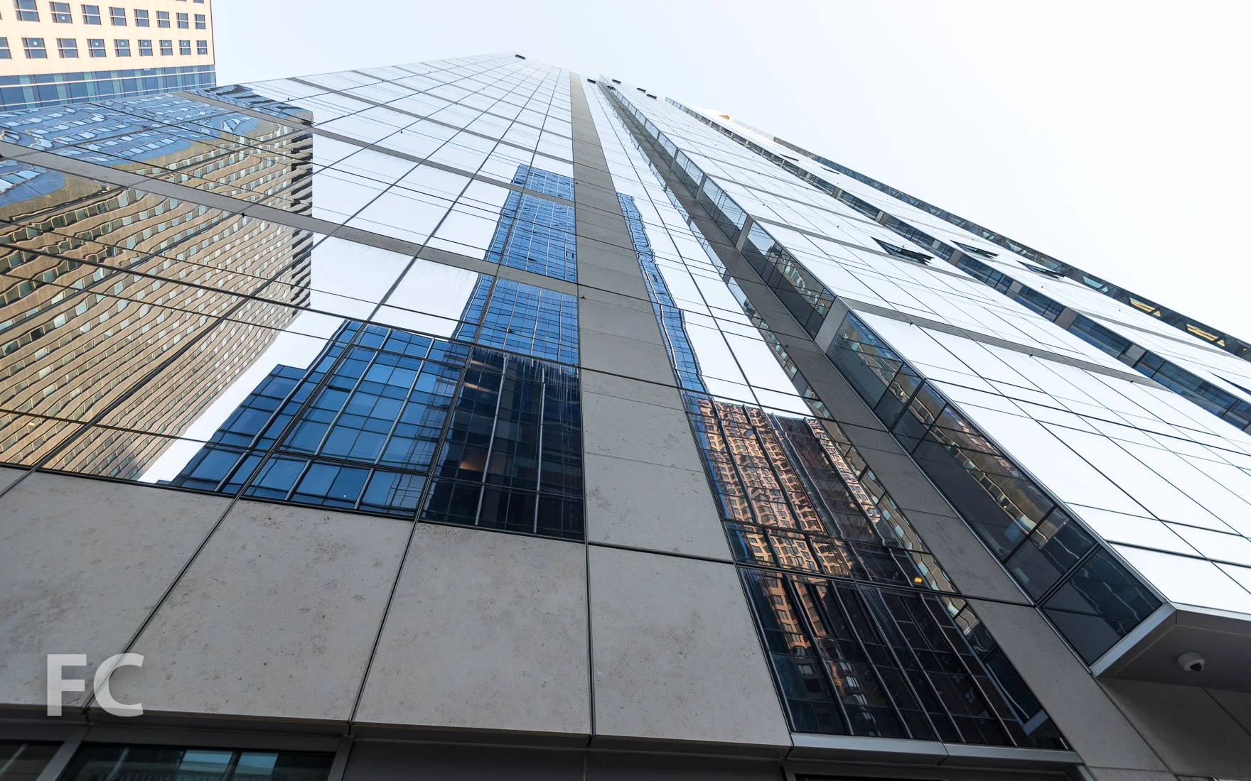 Looking up at the west façade from the outdoor terrace.