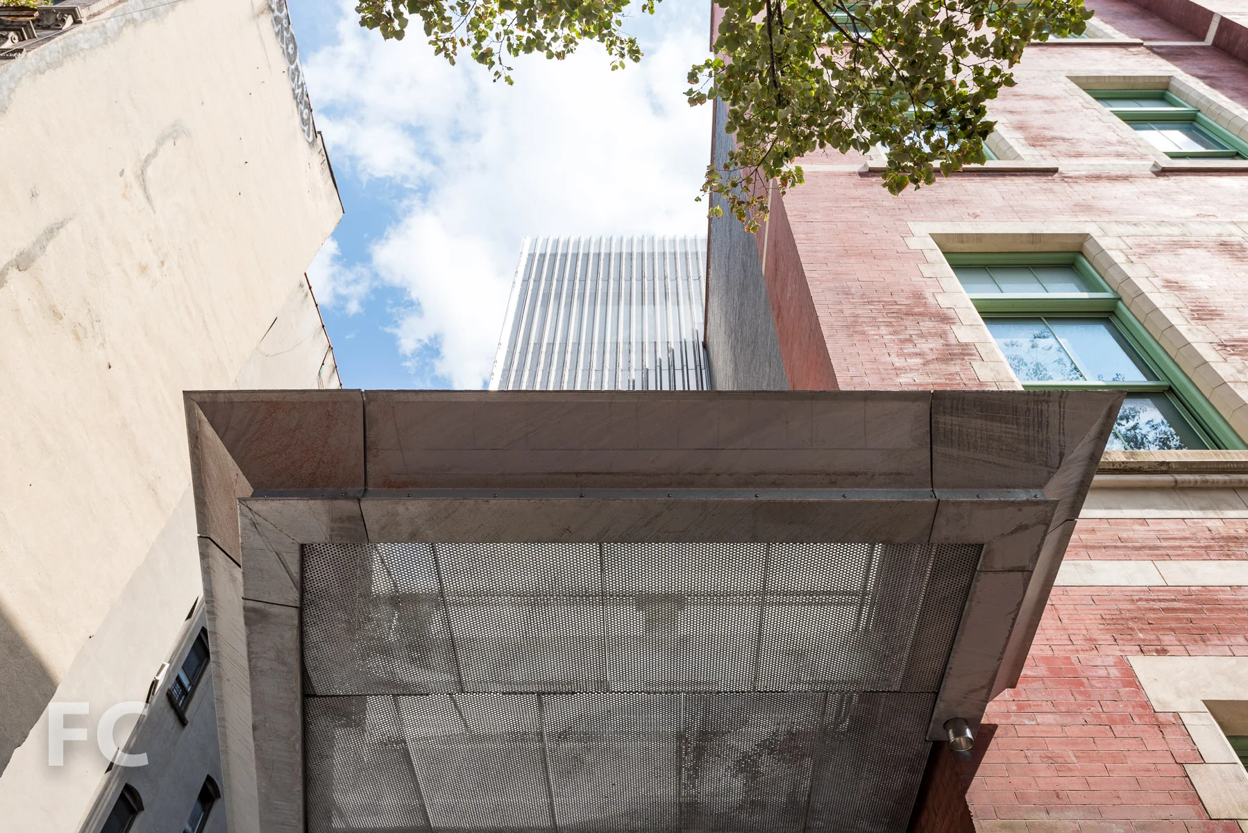 Looking up at the entrance canopy of the new addition.