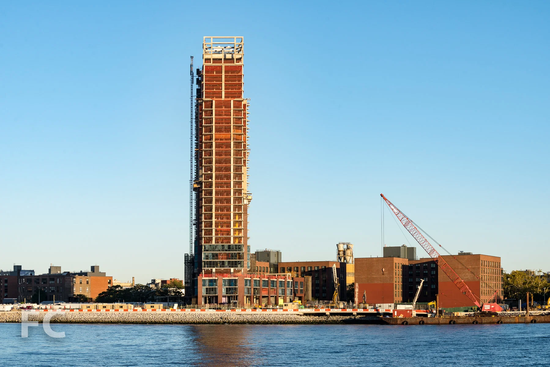North façade of 37 Blue Slip (center) and the second market rate tower (right).