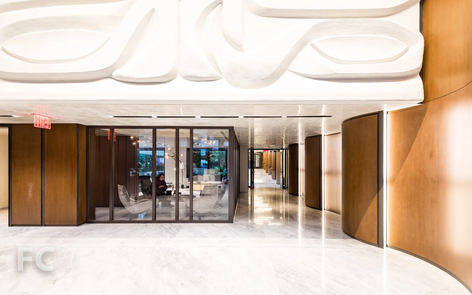The residents' lounge and courtyard breezeway from the residential lobby.