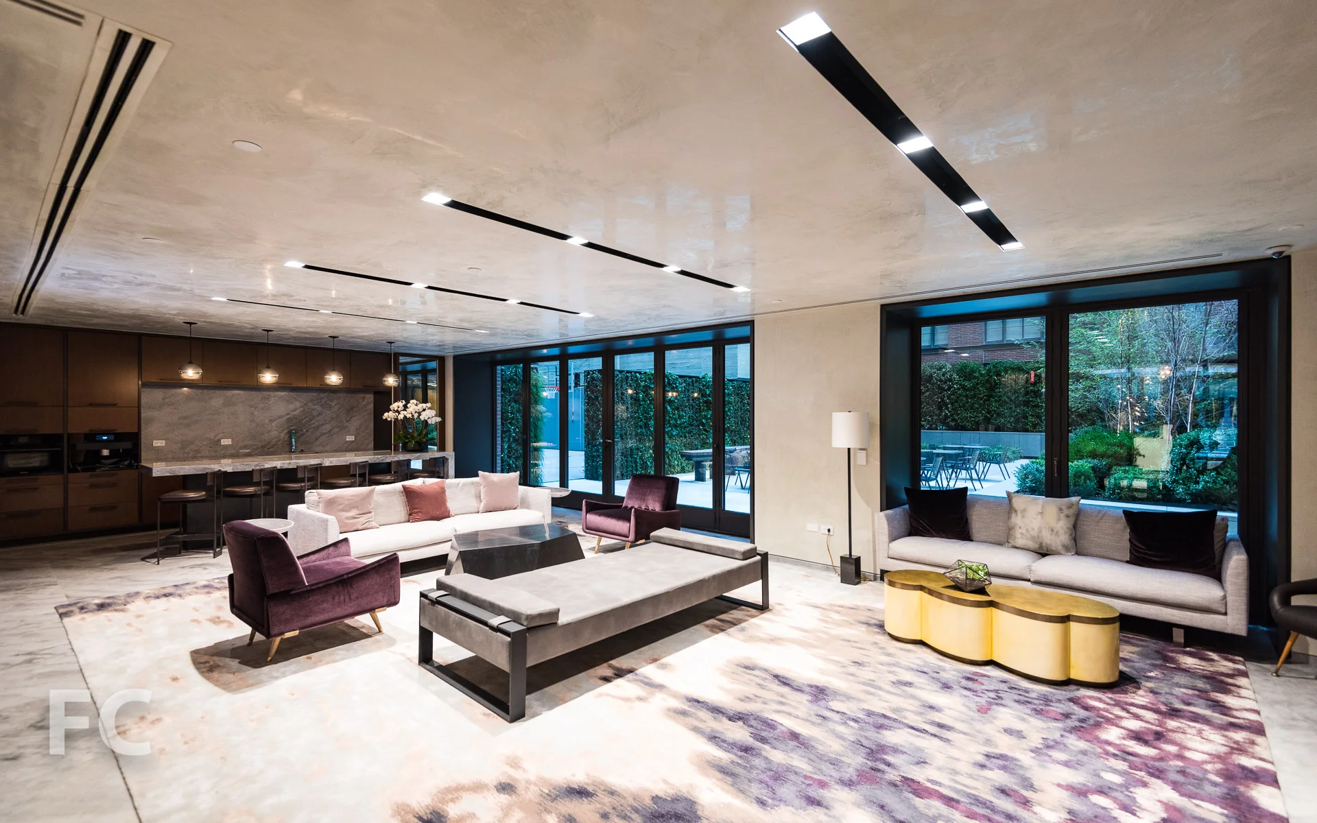 Residents' lounge with a view of the courtyard.