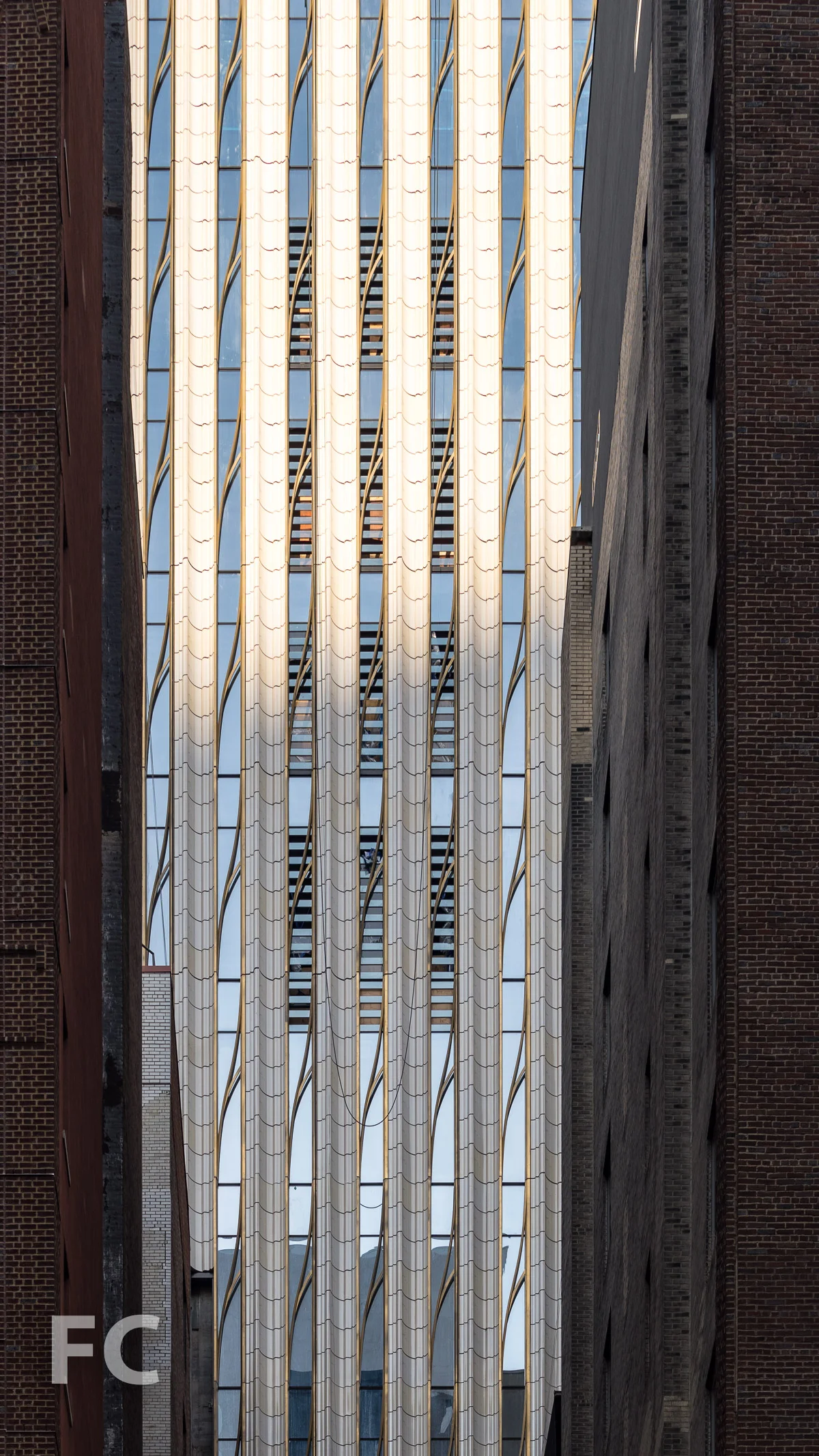 Close-up of the east terra-cotta and glass facade.