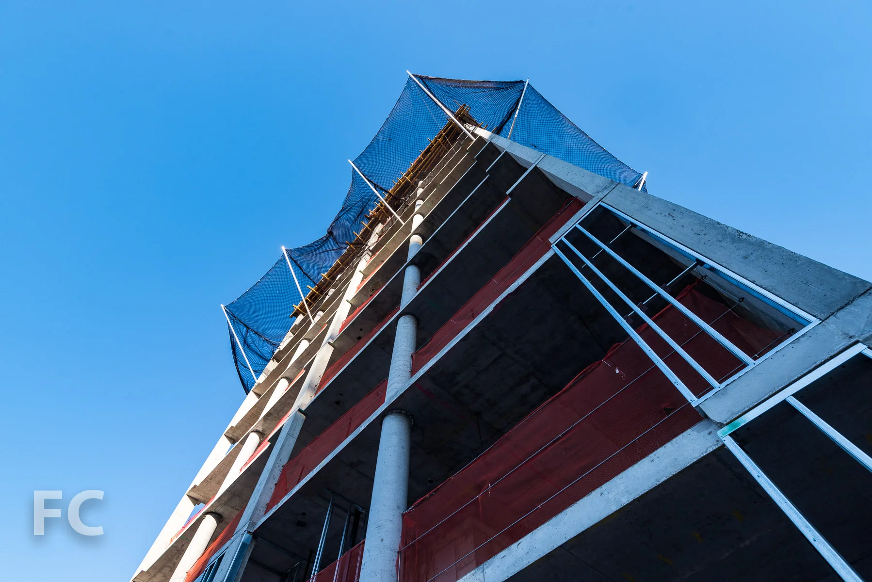 Looking up at the south facade.
