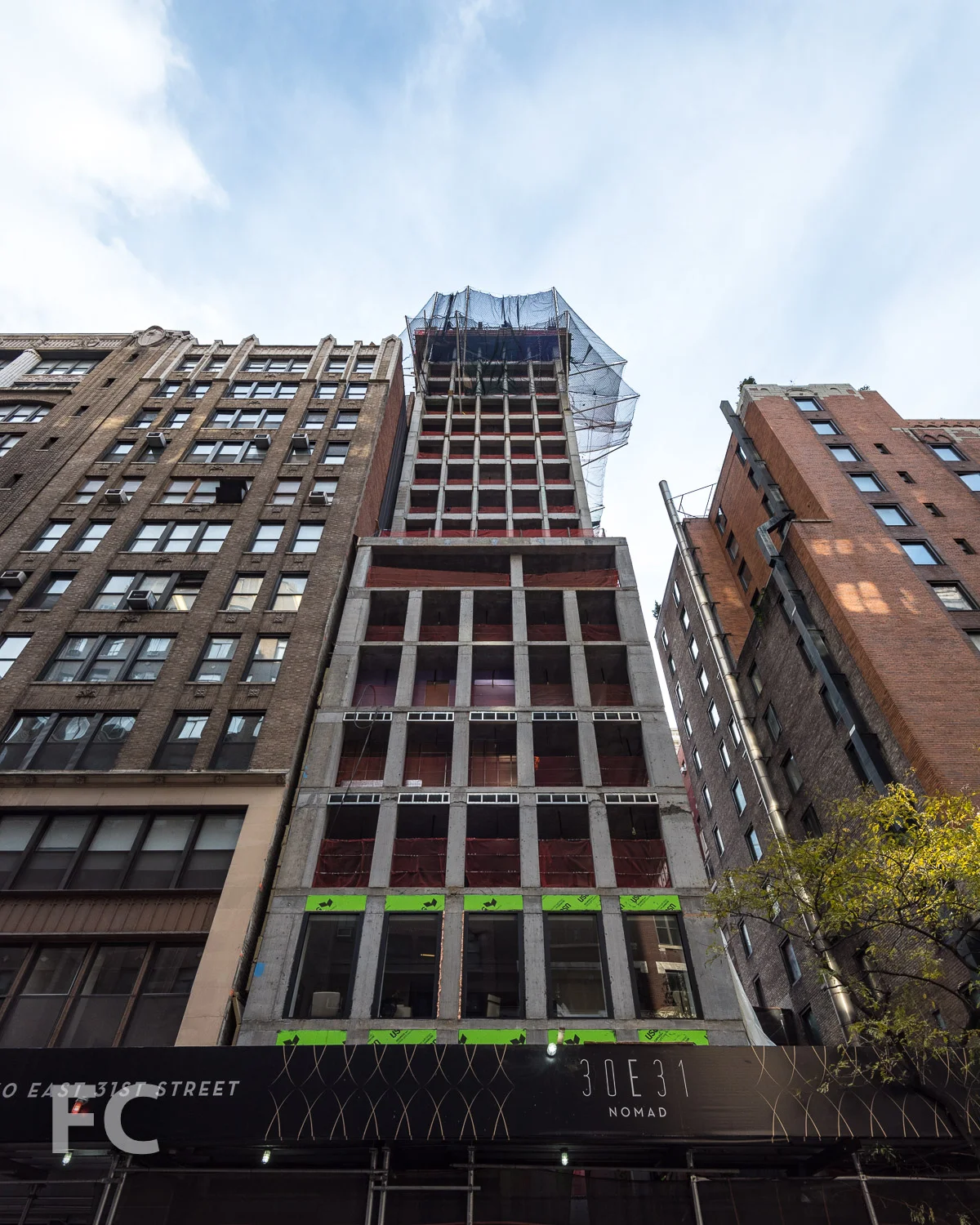 Looking up at the north facade from East 31st Street.