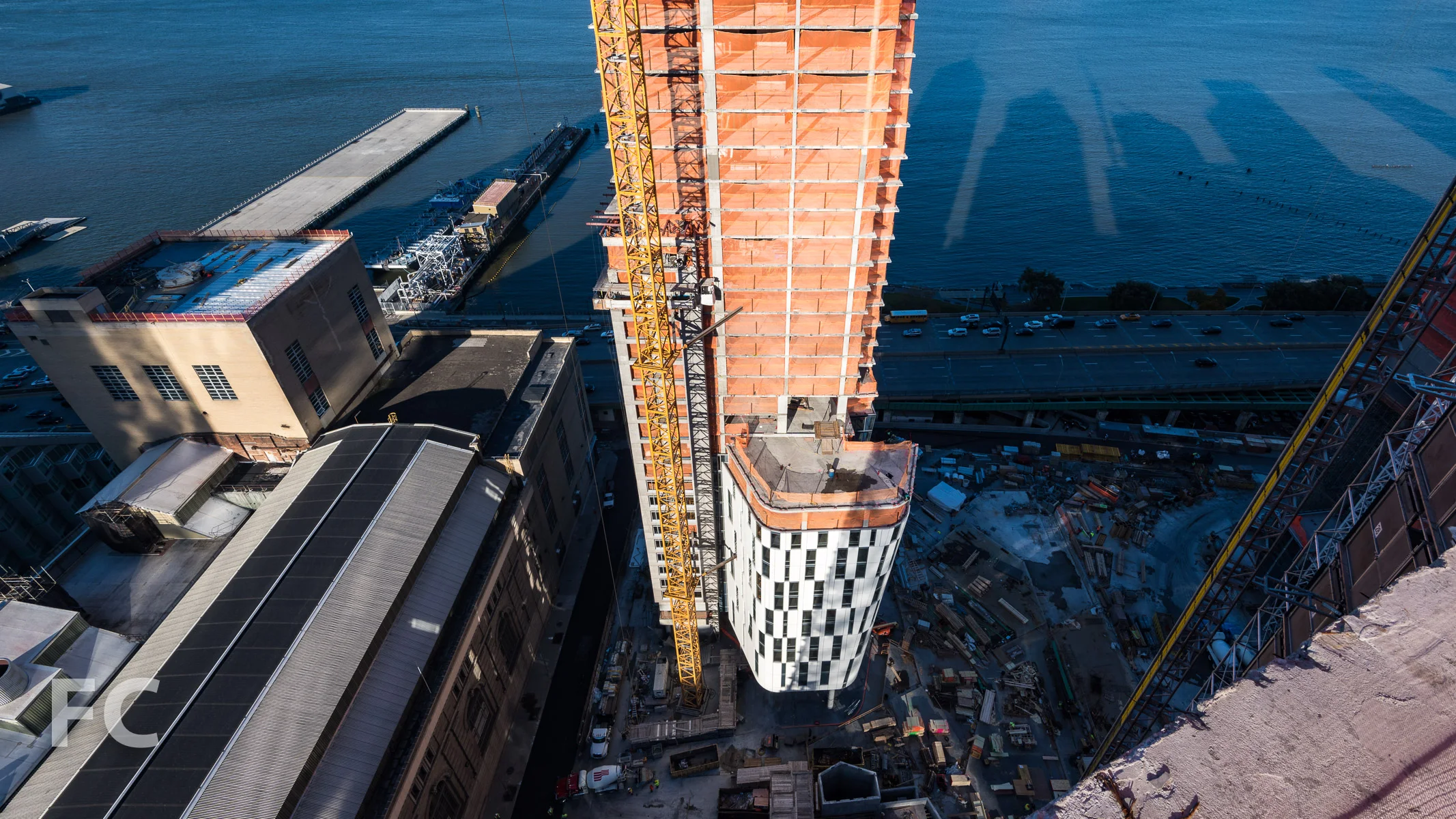 Looking down on the east facade of One Waterline Square.
