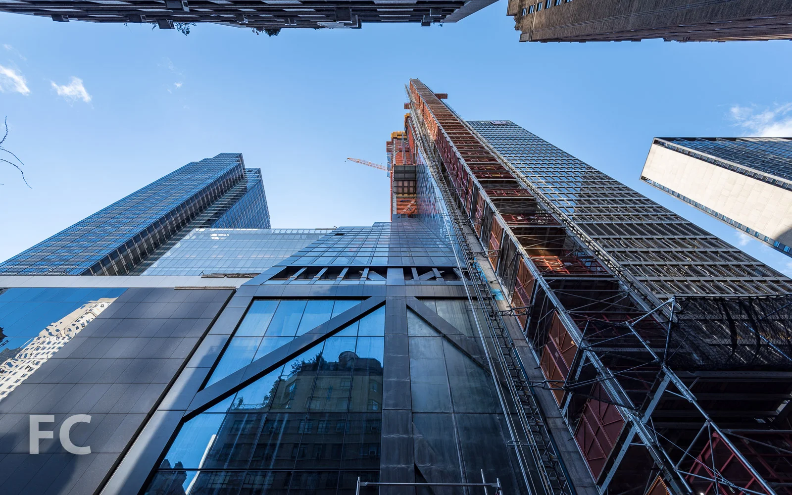 Looking up at the north façade from West 54th Street.