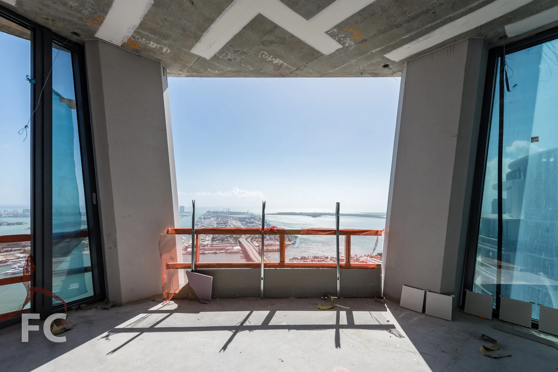 Southeast corner view from a penthouse interior.