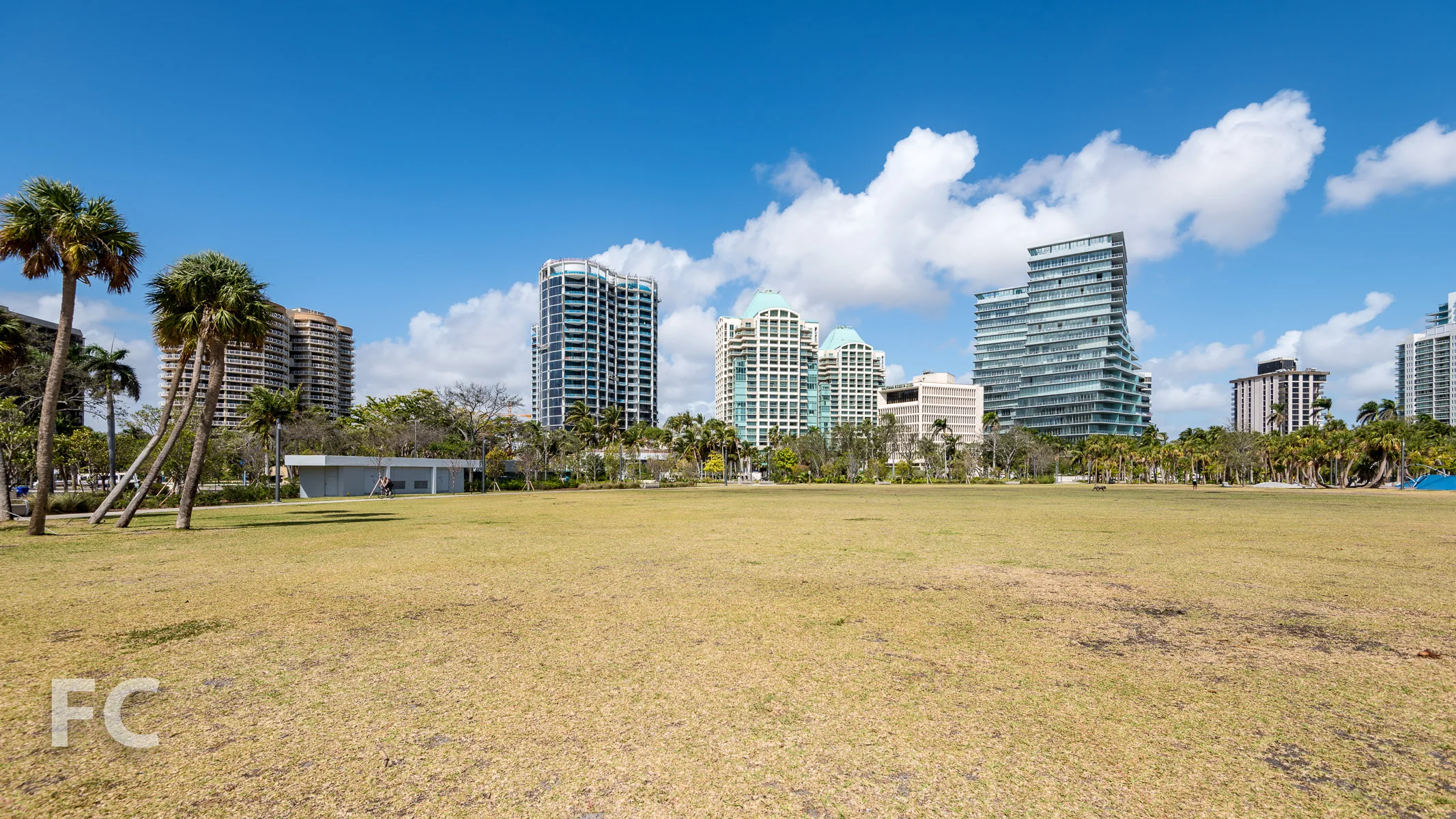 Park Grove (center) and the Grove at Grand Bay (right) from Regatta Park.