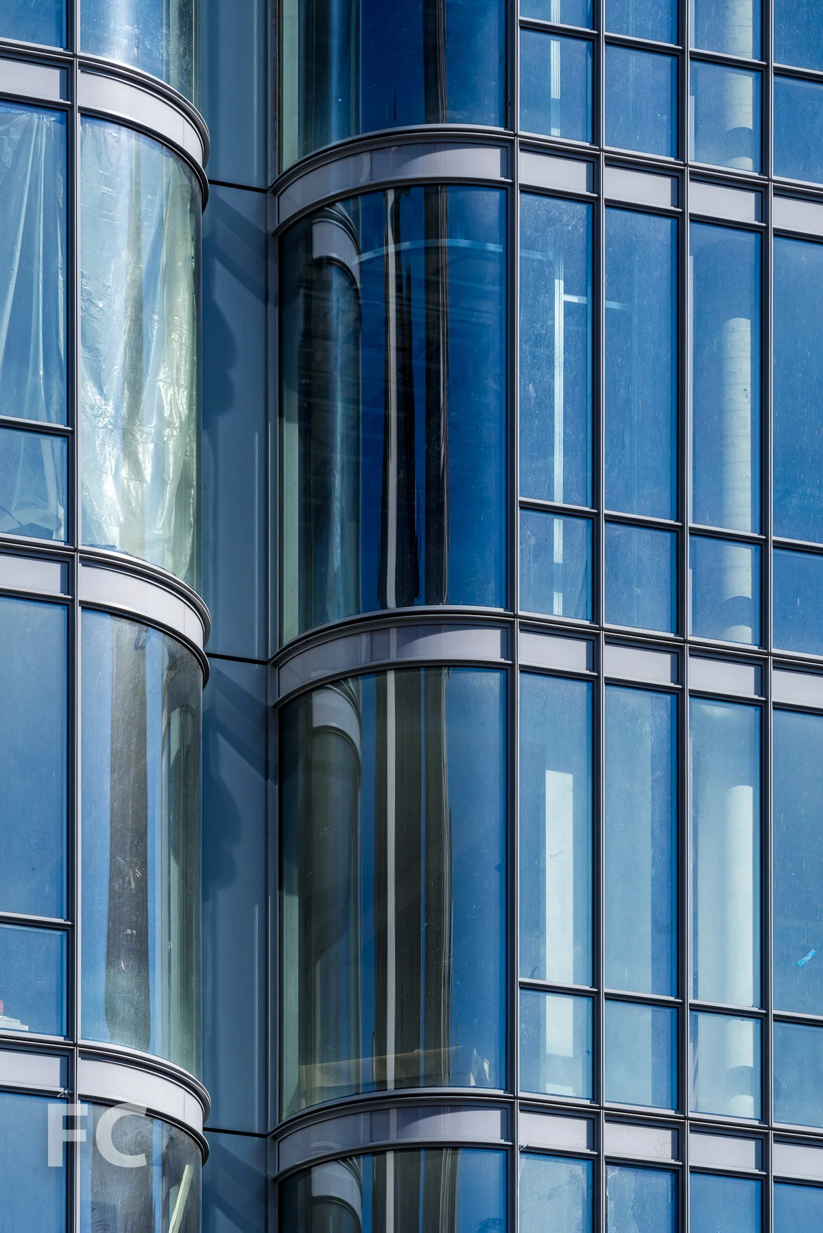 Close-up of the glass curtain wall.