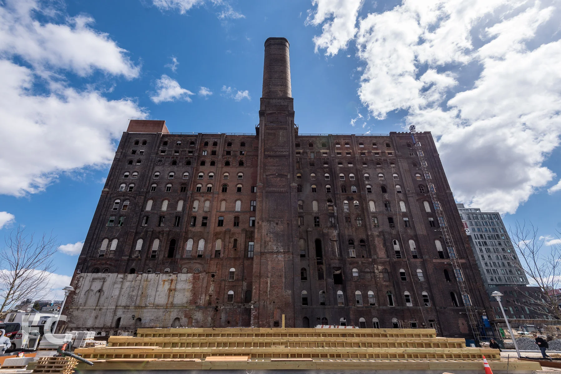 Looking up at the refinery building from Water Square.