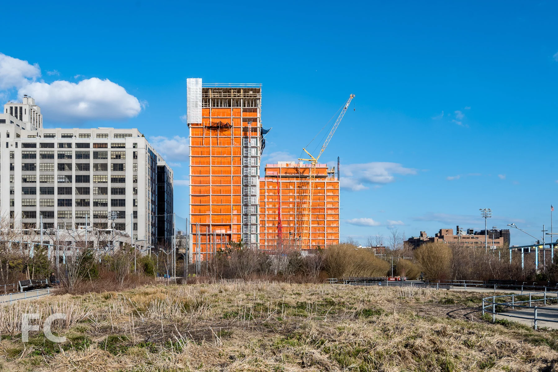 West facade of 15 Bridge Park Drive (right) and 50 Bridge Park Drive (left) from Pier 6 at Brooklyn Bridge Park.