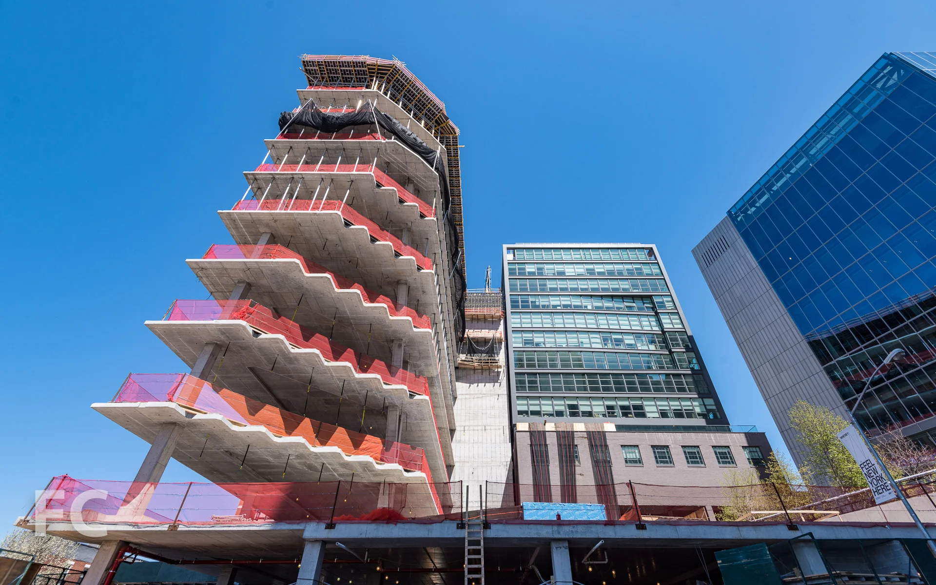 Looking up at the south facade of 40 Tenth Avenue (left) and 450 West 14th Street (right).