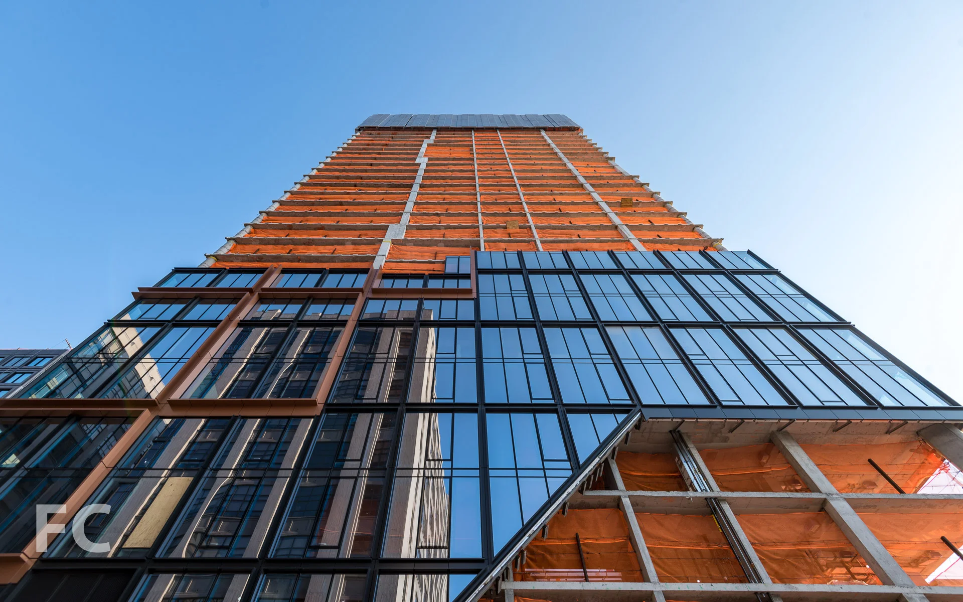 Looking up at the north facade of 50 Bridge Park Drive.