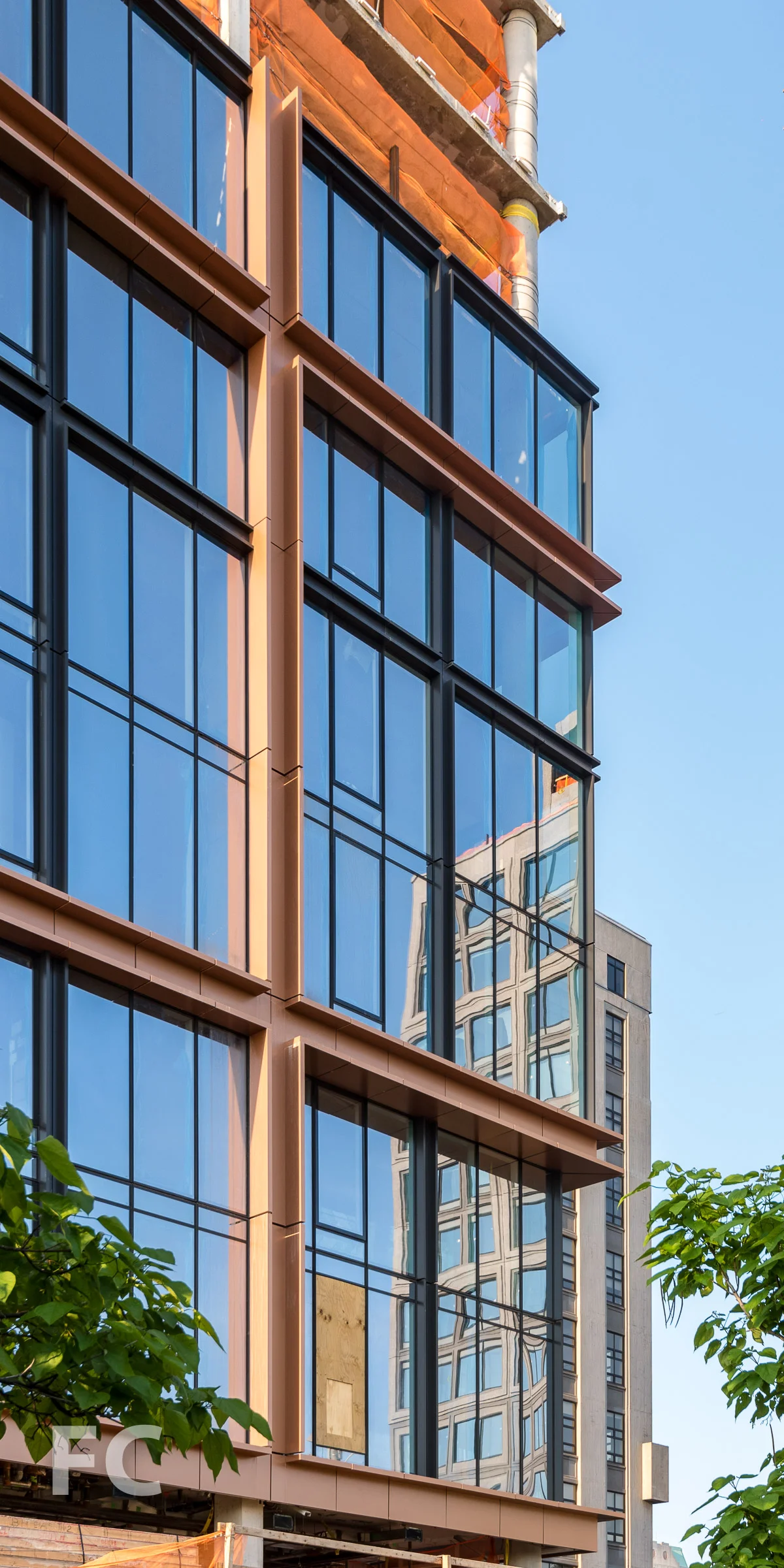 Southeast corner of the facade of 50 Bridge Park Drive.