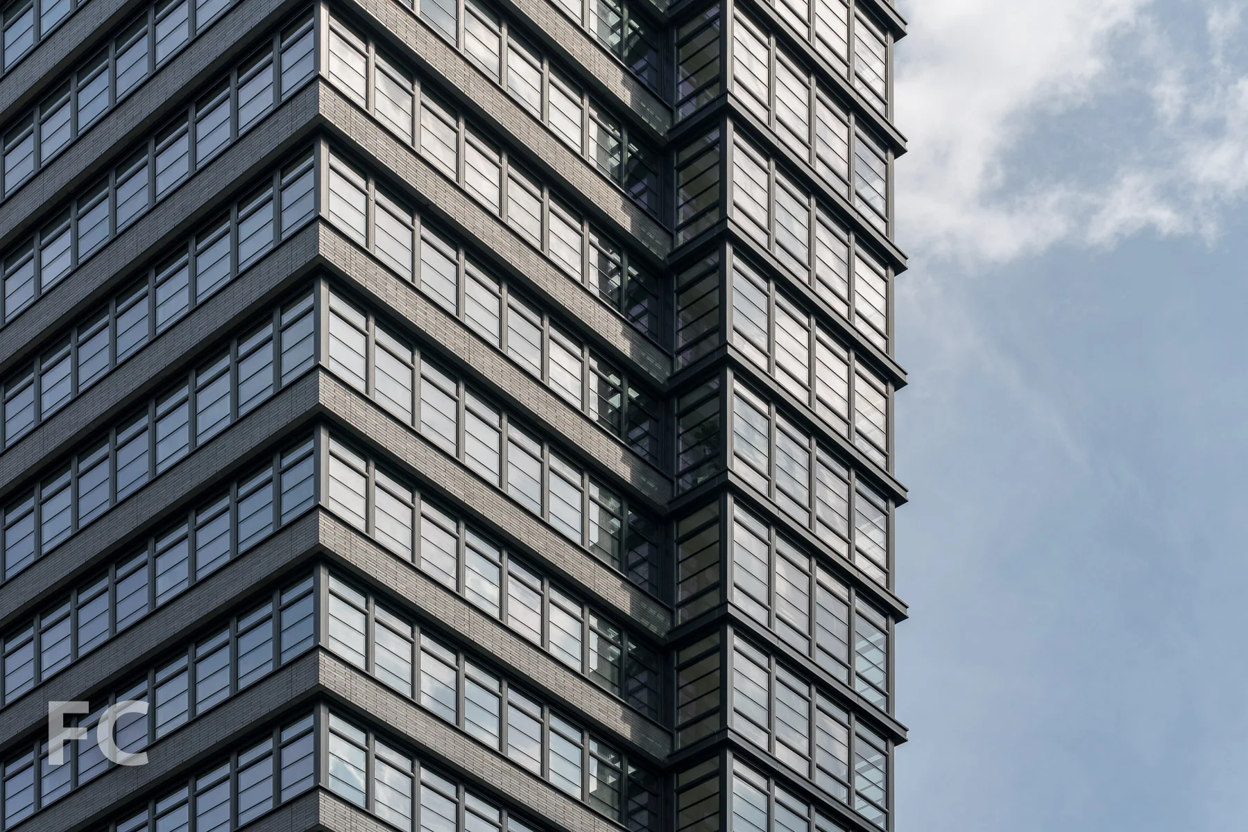 Close-up of the northwest corner of the tower's facade.