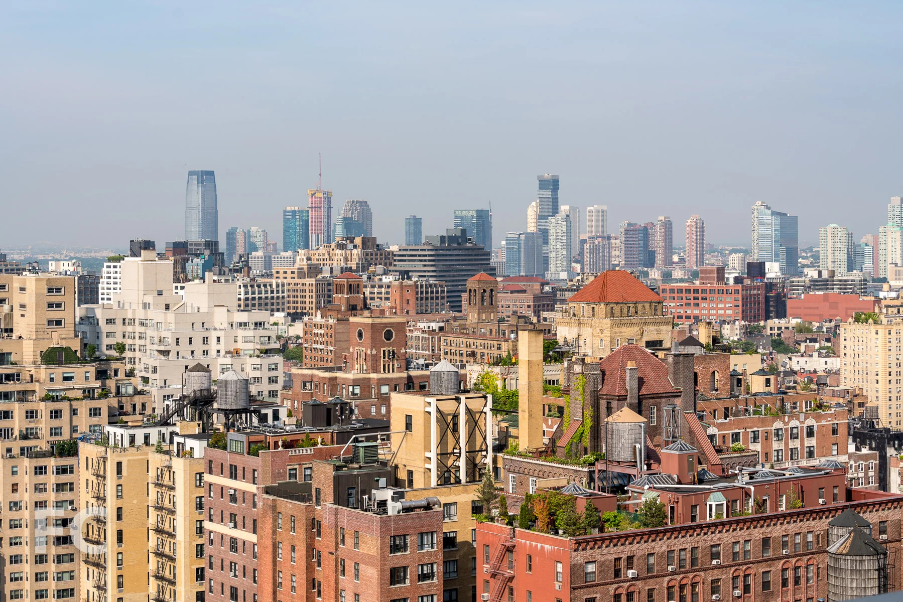 View southwest towards the West Village and Jersey City from the penthouse.