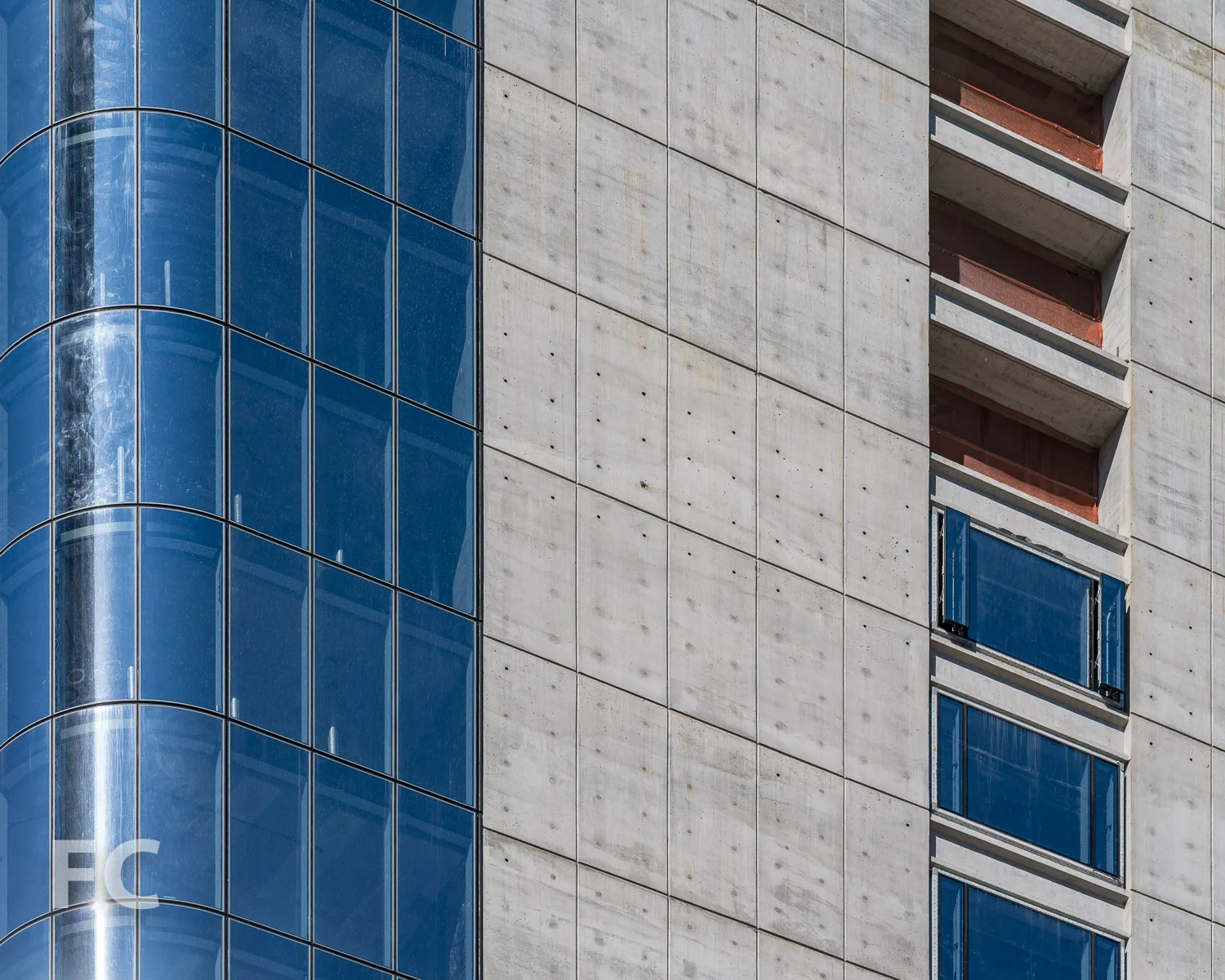 Close-up of the curtain wall and windows installed on the south facade.