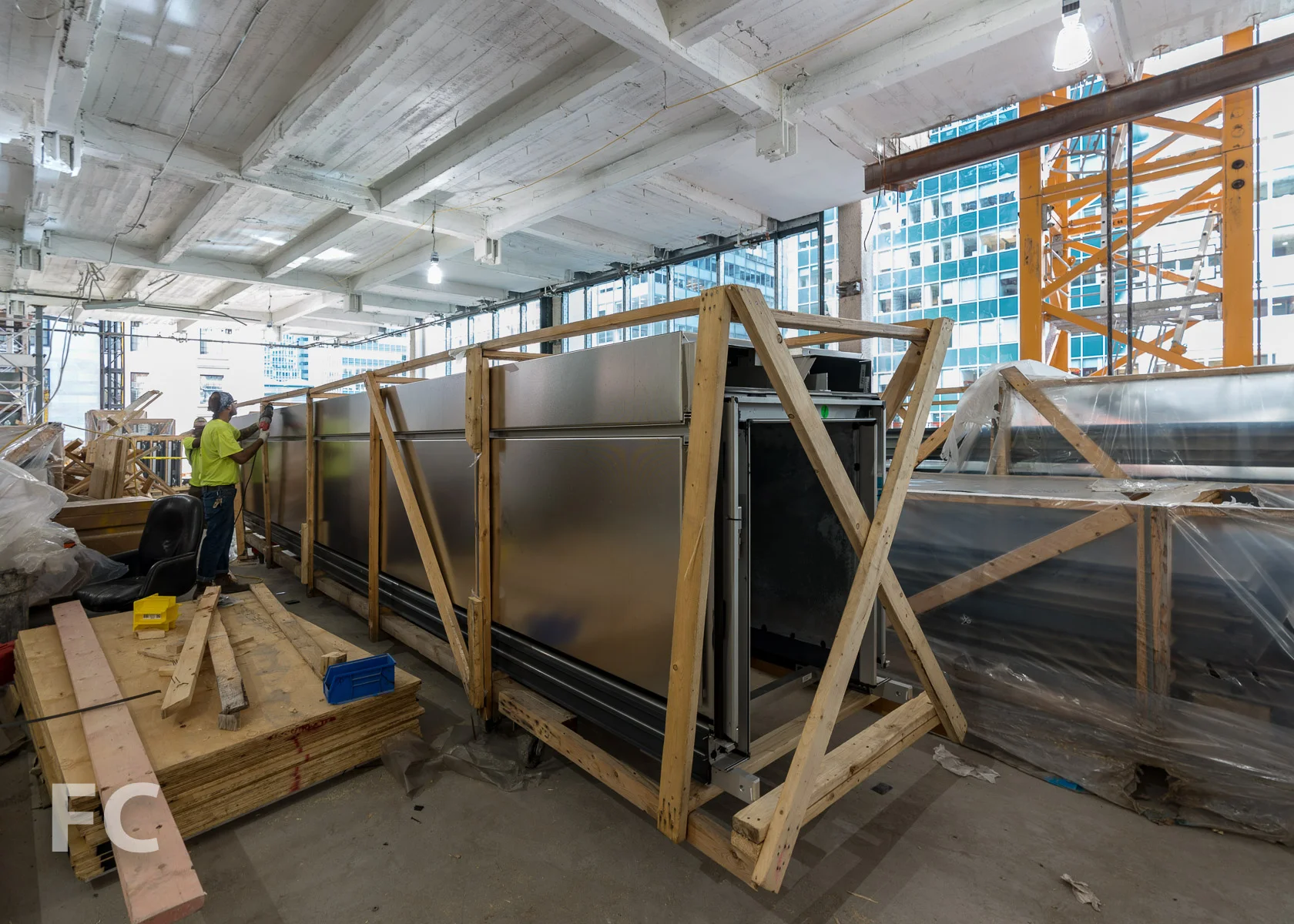 Column cover getting unpacked in preparation for installation.