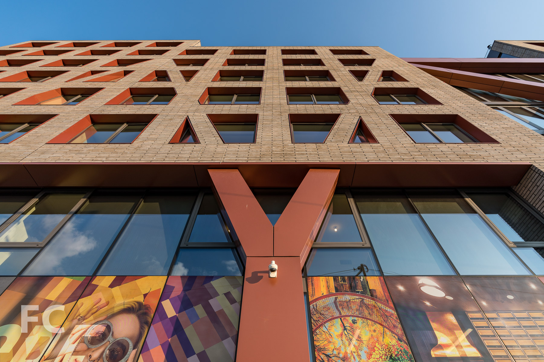 Looking up at the north facade from Noll Street.