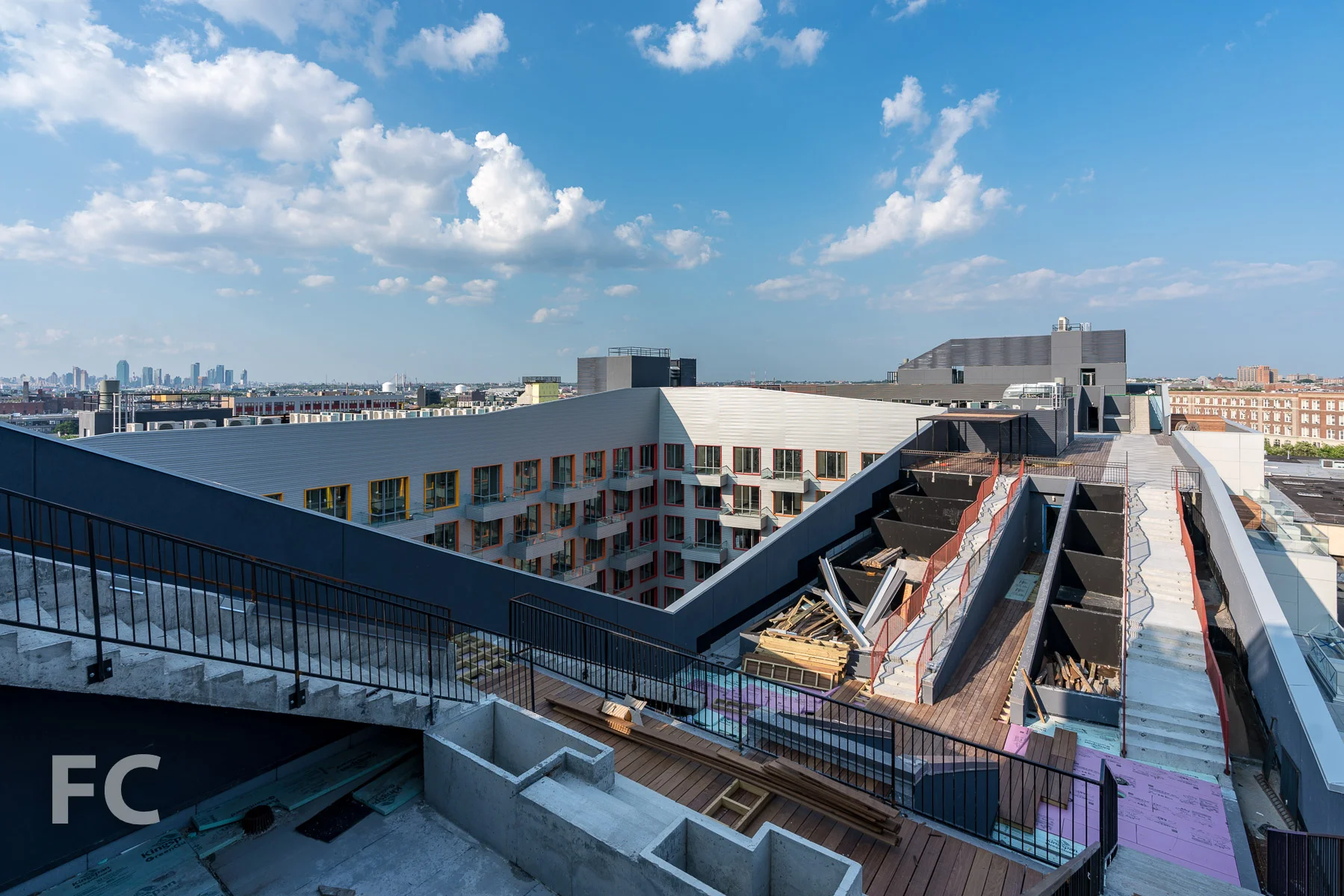 Rooftop amenity deck under construction.