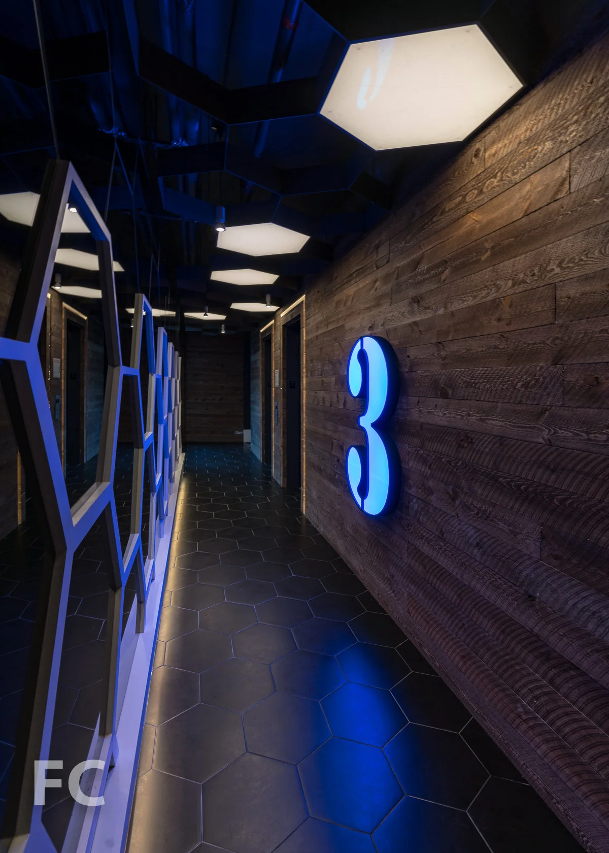 Typical residential corridor and elevator lobby.