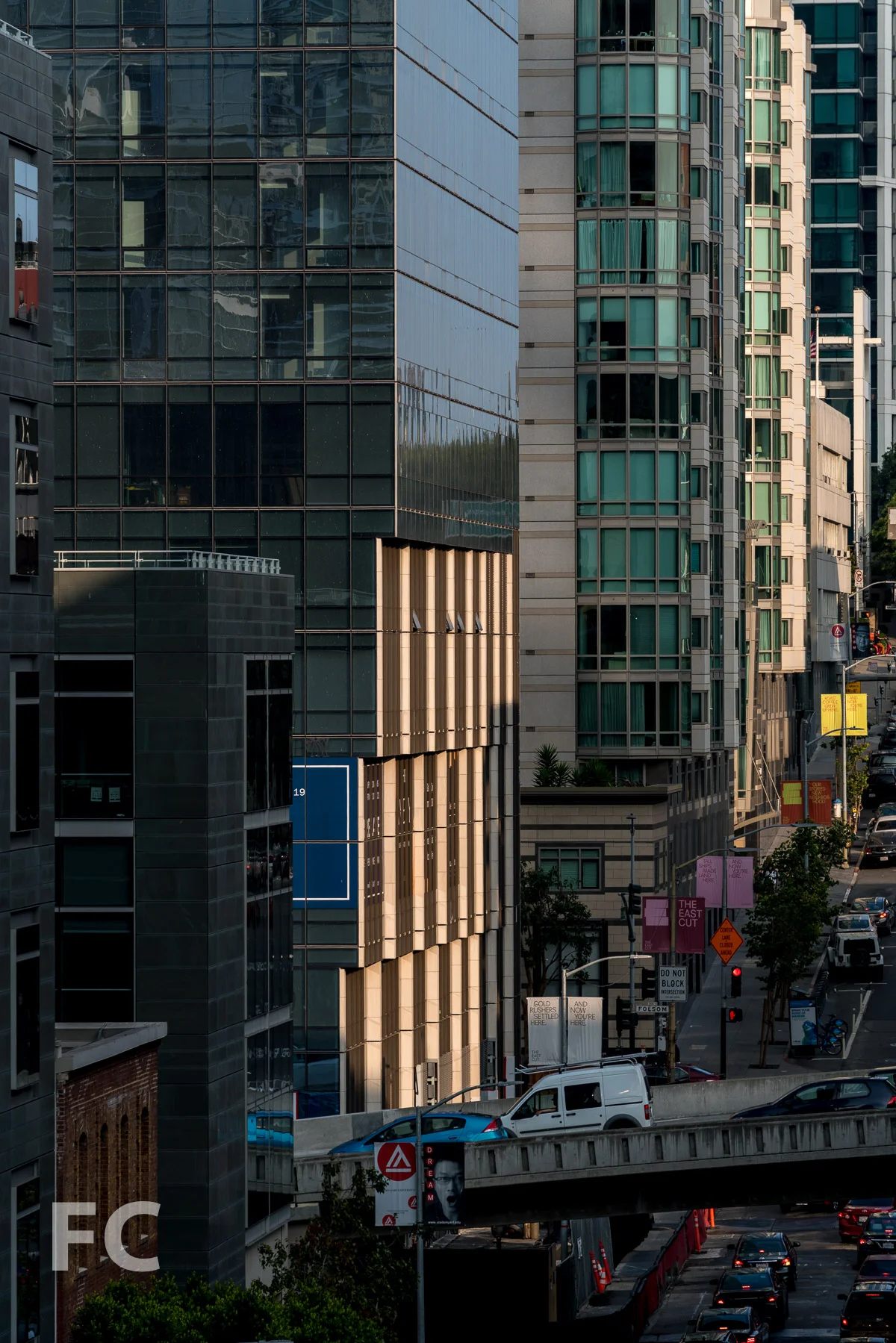 Sunset reflects off of the south facade.