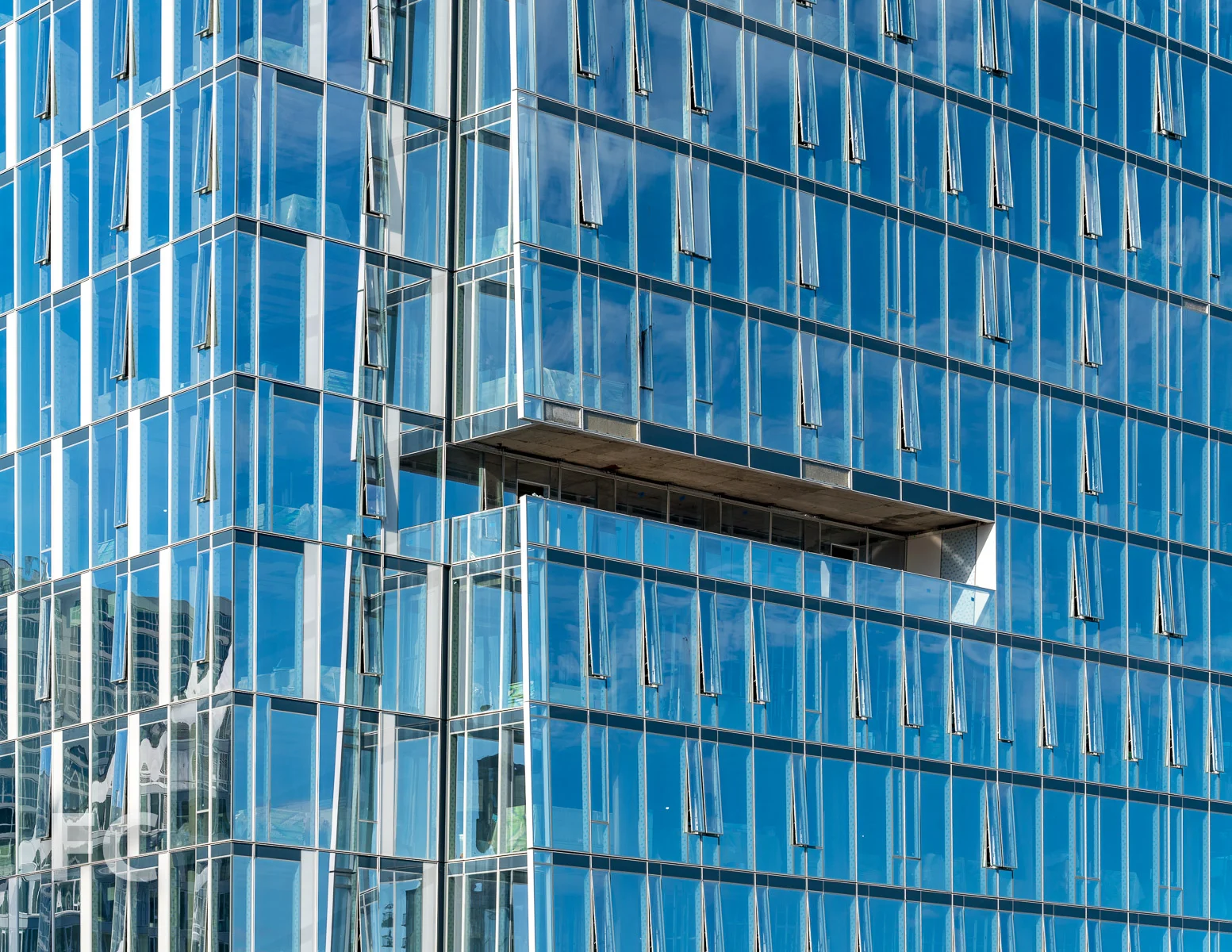 Closeup of the northeast corner of the facade at One Waterline Square.