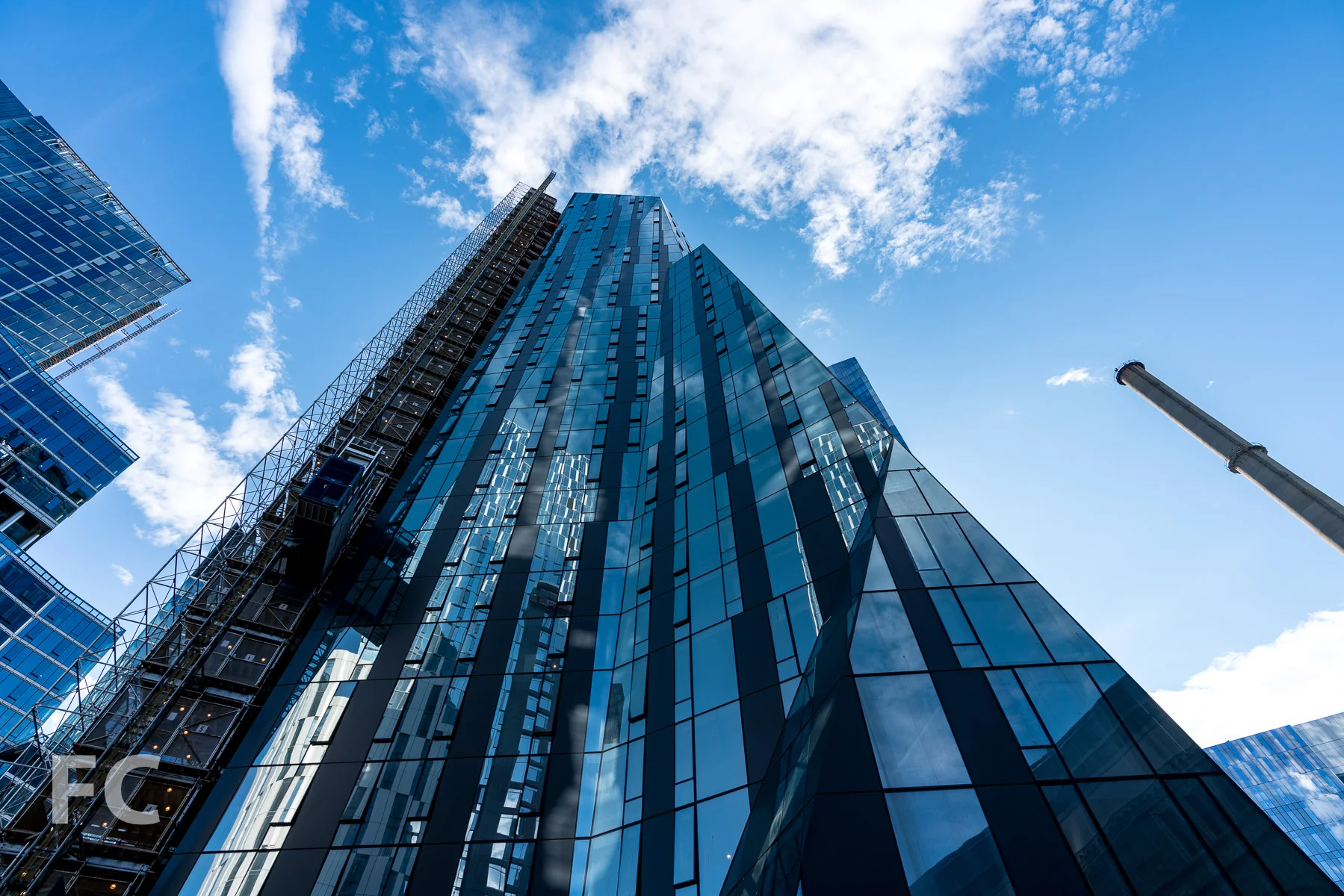 Looking up at Three Waterline Square.