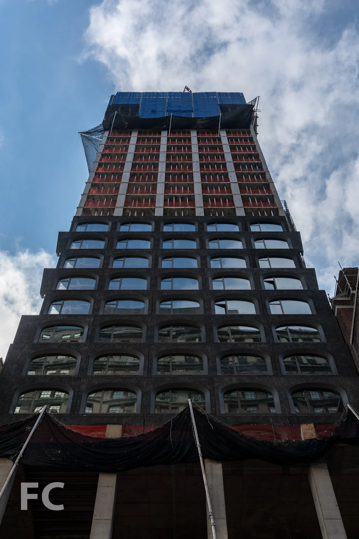 Looking up at the north facade from Fulton Street.