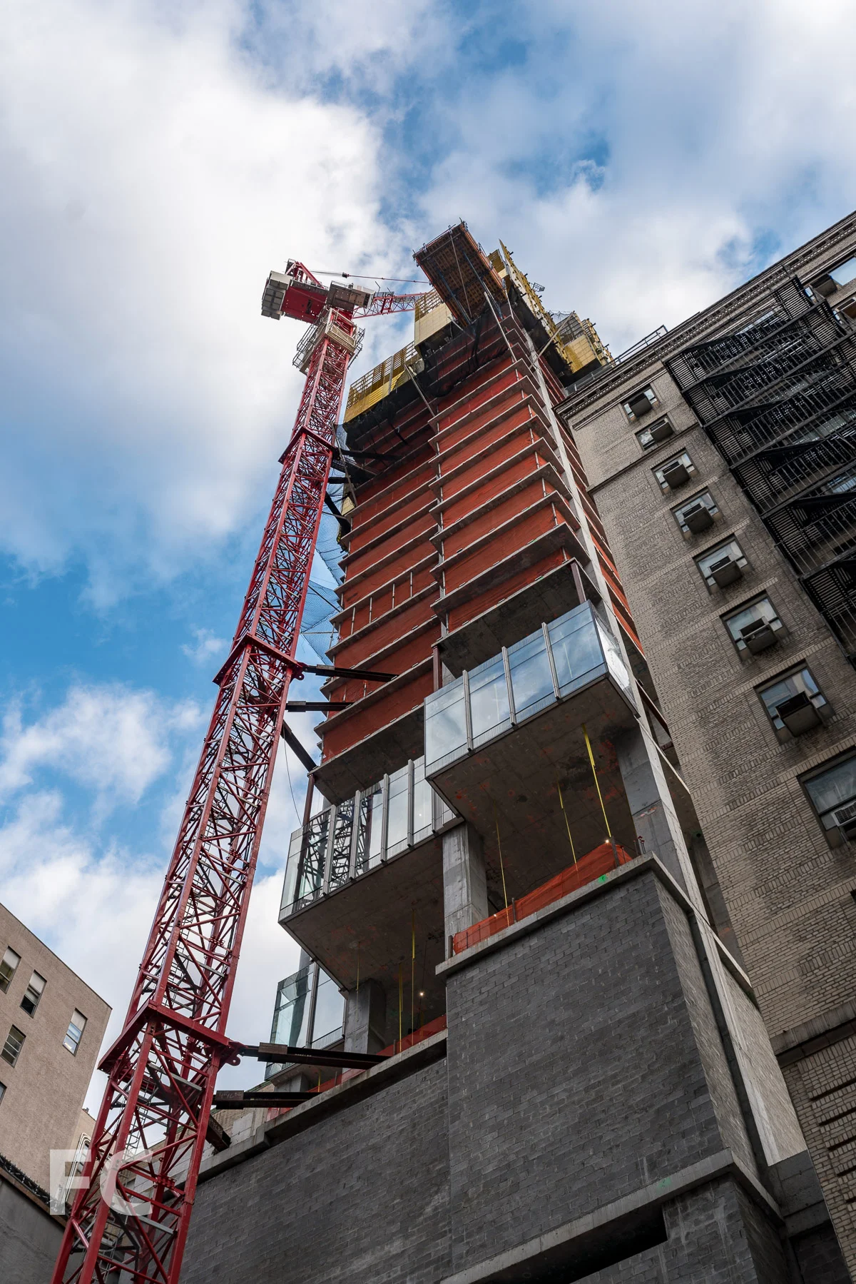 Looking up at the south facade from East 30th Street.