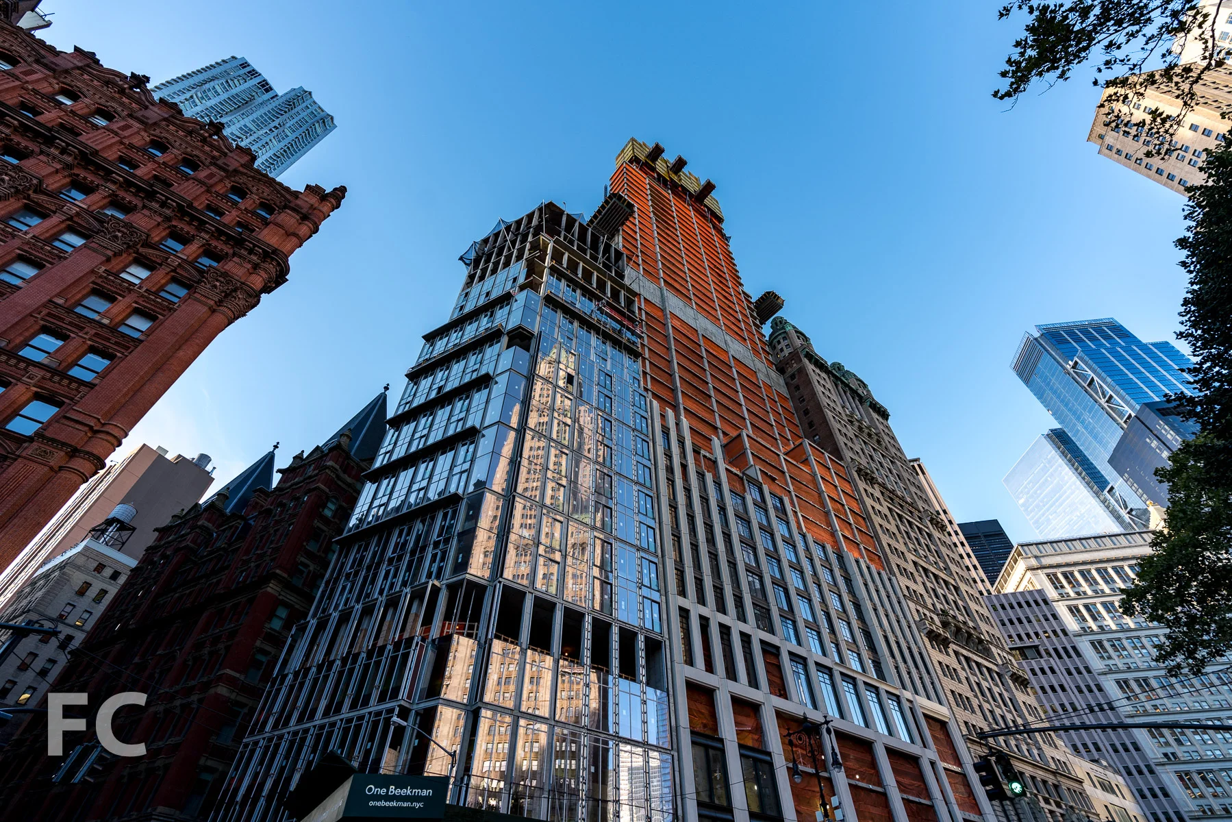 Looking up at the northeast corner of 1 Beekman (left) and 25 Park Row (right).