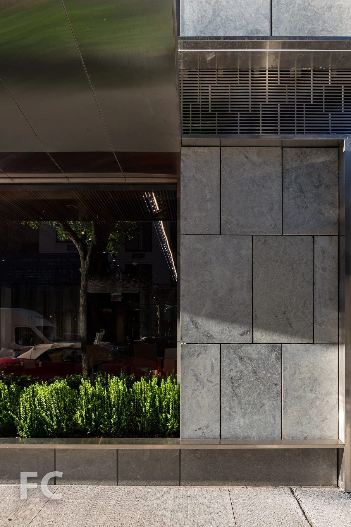 Residential entry facade detail.