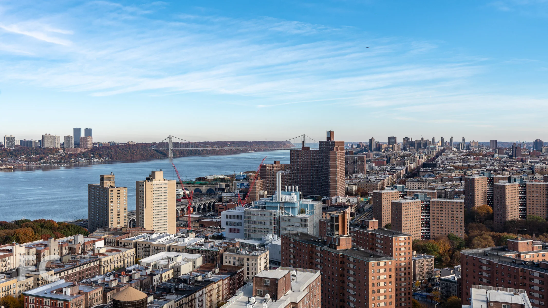 View northwest towards Columbia University’s Manhattanville expansion campus and Harlem from an upper floor.