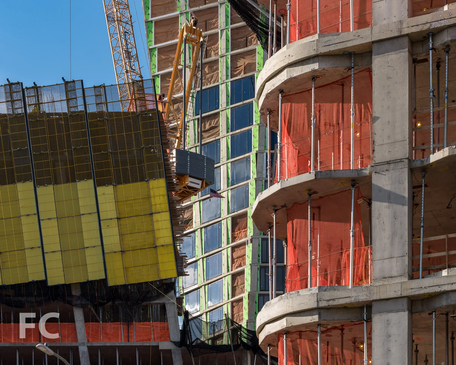 Closeup of the facade of The Eleventh (left) and 515 W 18 (right).