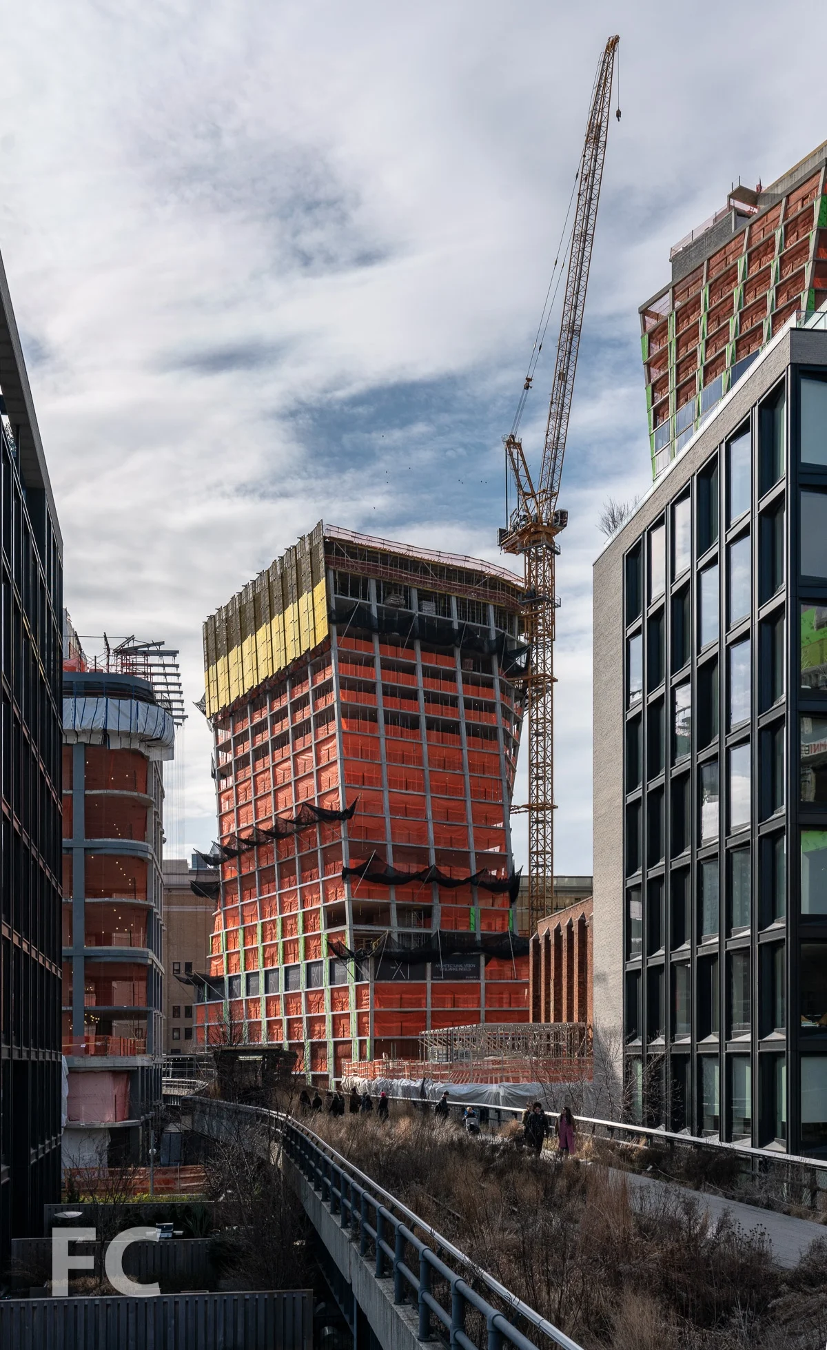 View of the east tower rising above the High Line.