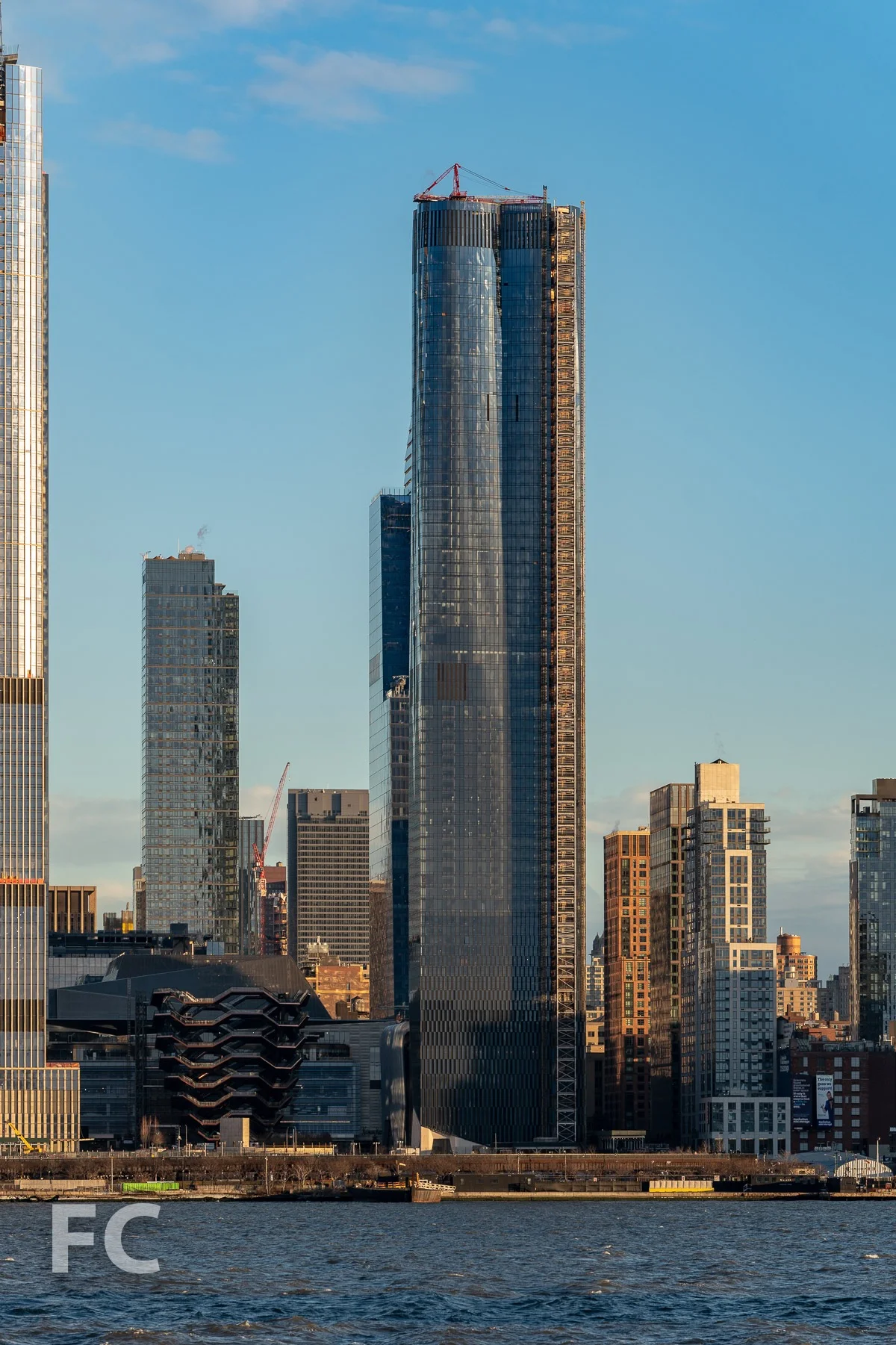 The Vessel (left) and 15 Hudson Yards (right).