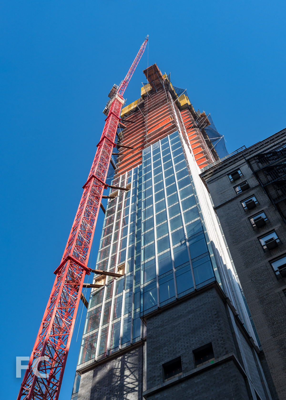 Looking up at the south facade from East 30th Street.